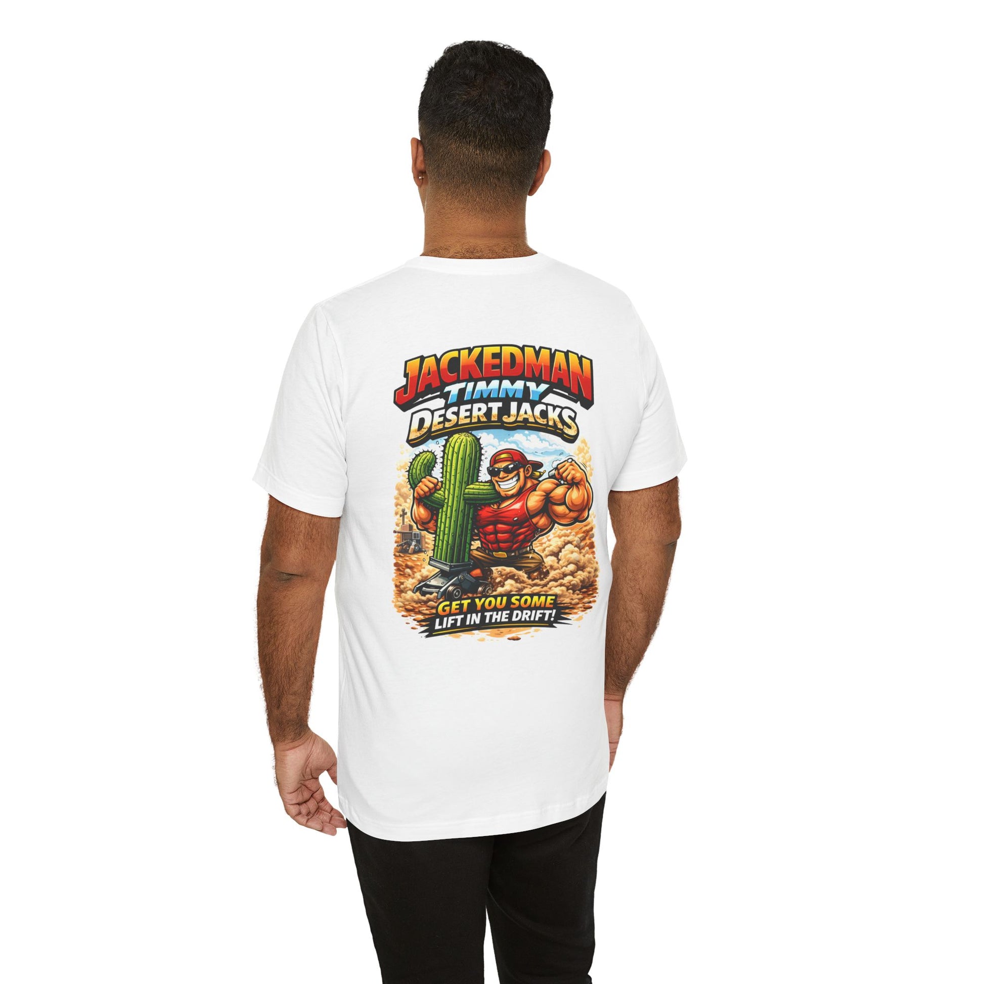 Person wearing a white t-shirt with a graphic design on the back, featuring 'Jackedman Timmy Desert Jacks Get You Some Lift In The Drift' text and a character.