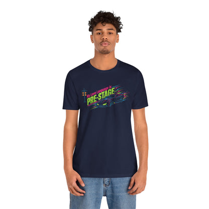 Person wearing a navy blue t-shirt with colorful text 'My Love Language is Pre-Stage' and graphics on a white background