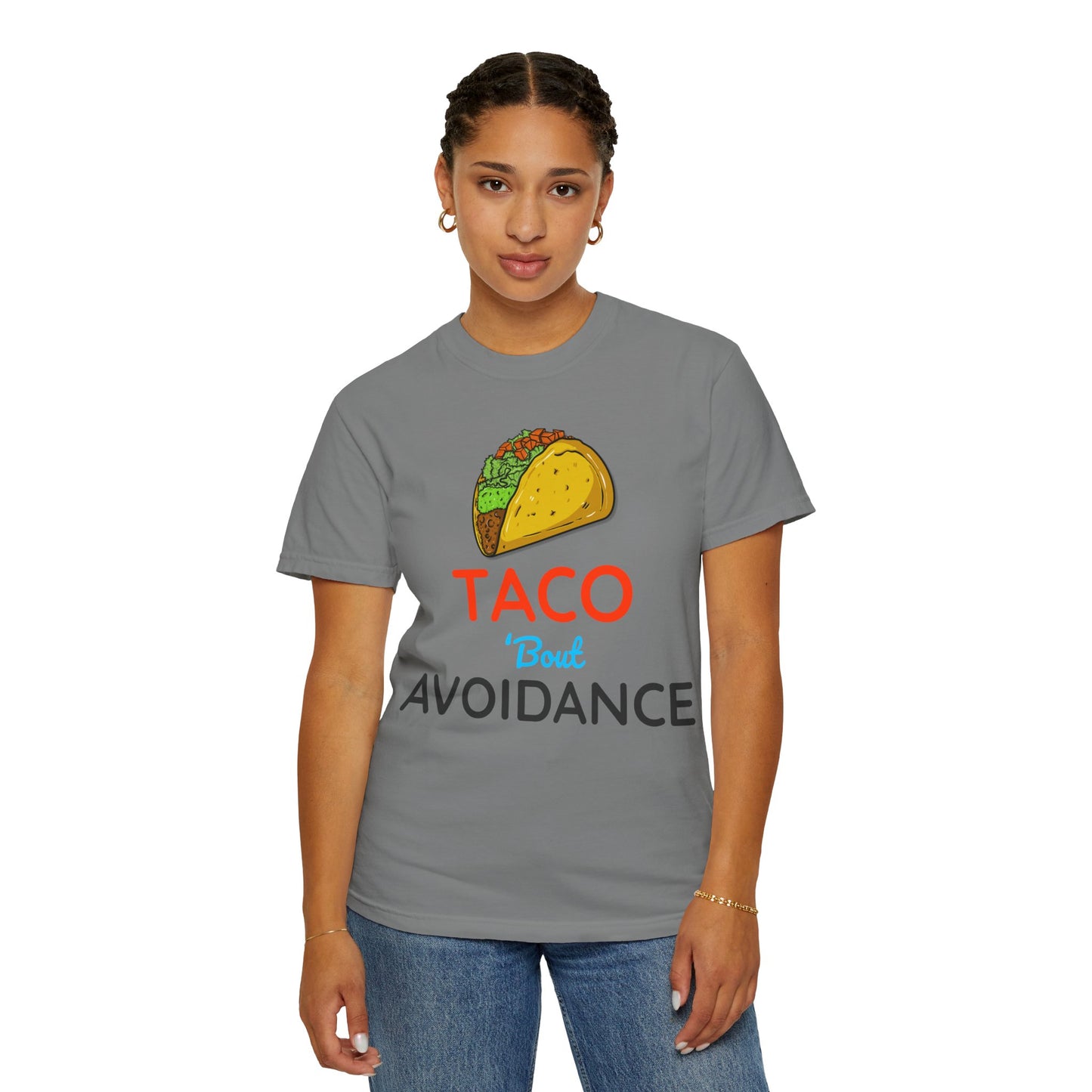 Person wearing a gray t-shirt with a taco graphic and text 'Taco 'bout avoidance' on a white background