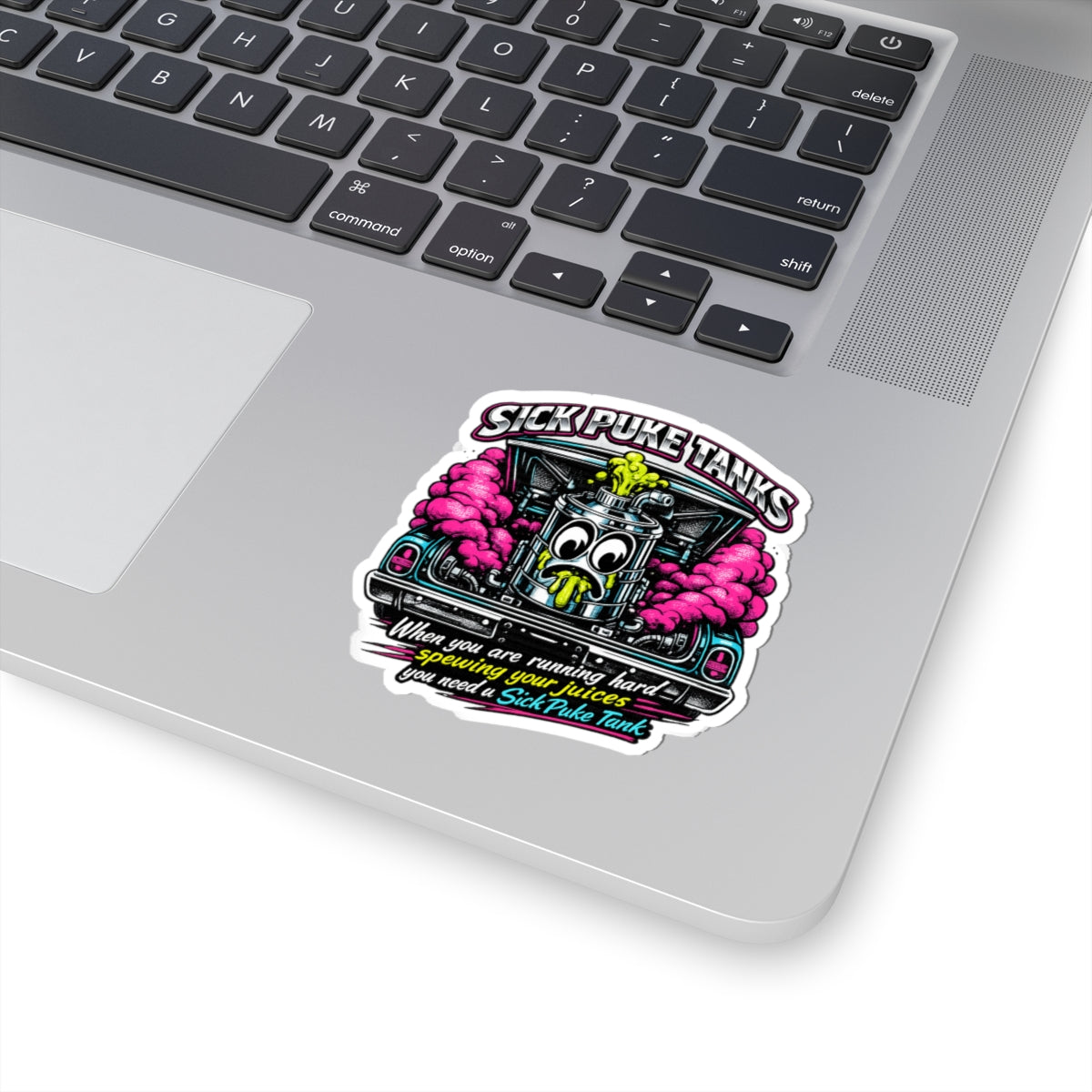 A colorful “Sick Puke Tank” kiss‑cut sticker featuring a bold, cartoon‑style engine puke tank with neon accents and playful lettering. The design has a bright, high‑contrast motorsport aesthetic and a clean white border around the edges, placed on a laptop hand rest