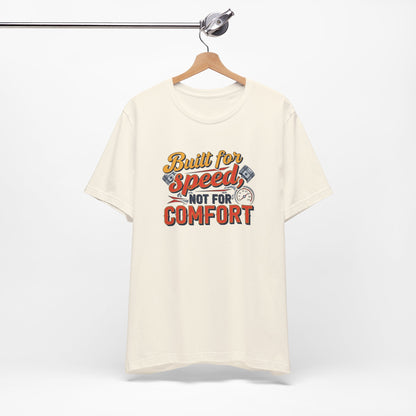White t-shirt with 'Built for Speed, Not for Comfort' text on a hanger against a white background