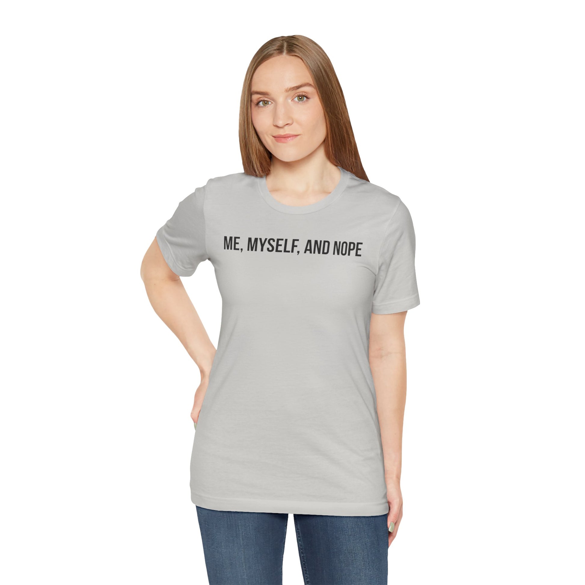 Woman wearing a gray t-shirt with 'ME, MYSELF, AND NOPE' text on a white background