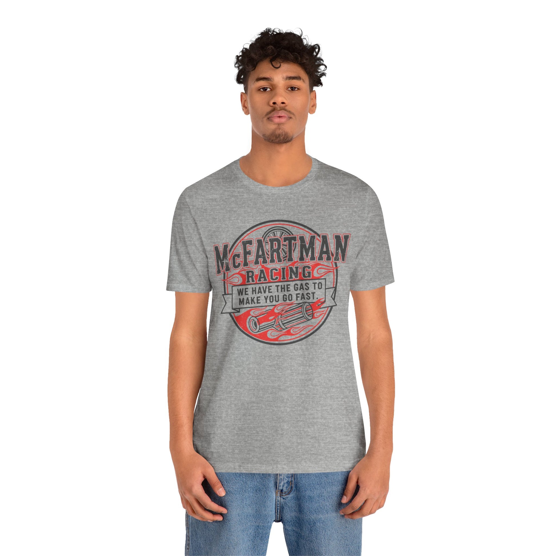 Man wearing a gray t-shirt with a red and black graphic design 'McFARTMAN Racing We have the gas to make you go fast' on a white background