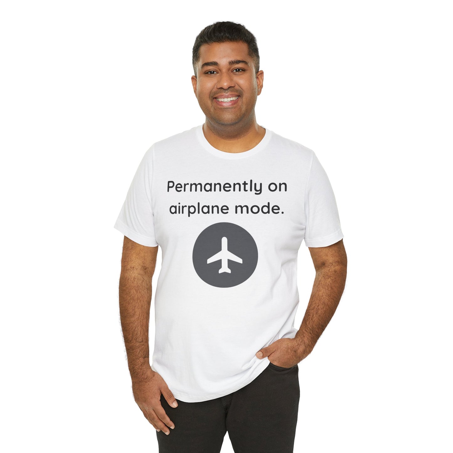 Man wearing a white t-shirt with text 'Permanently on airplane mode' and airplane icon on a white background