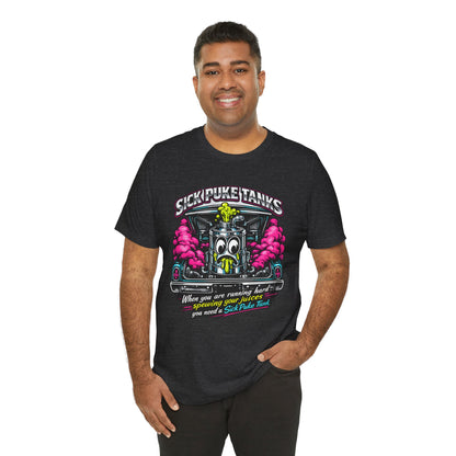Man wearing a dark gray heather t-shirt with a graphic design and 'Sick Puke Tanks When you are running hard spewing your juices you need a Sick Puke Tank' text