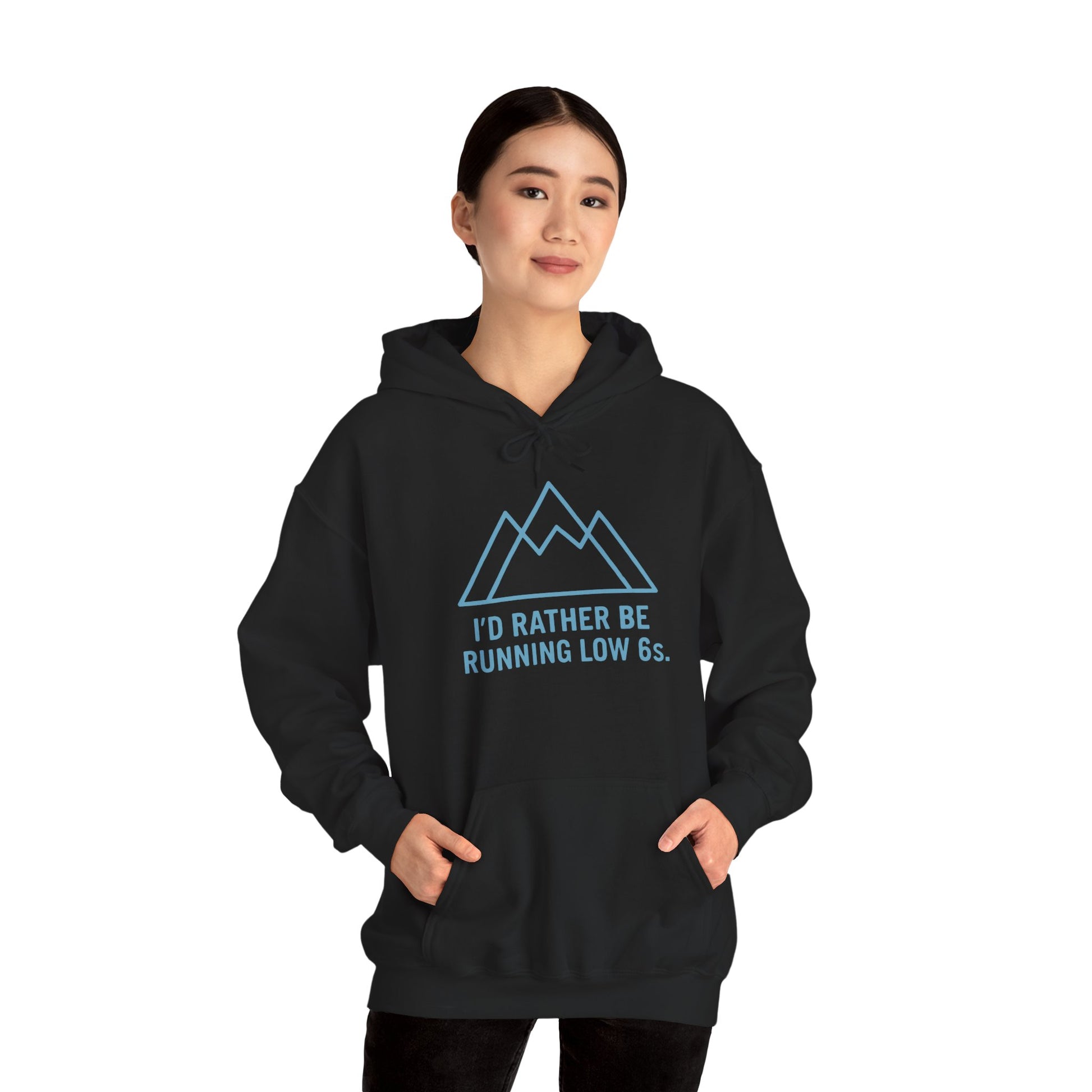 Person wearing a black hoodie with blue mountain graphic and text 'I'd rather be running low 6s' on a white background