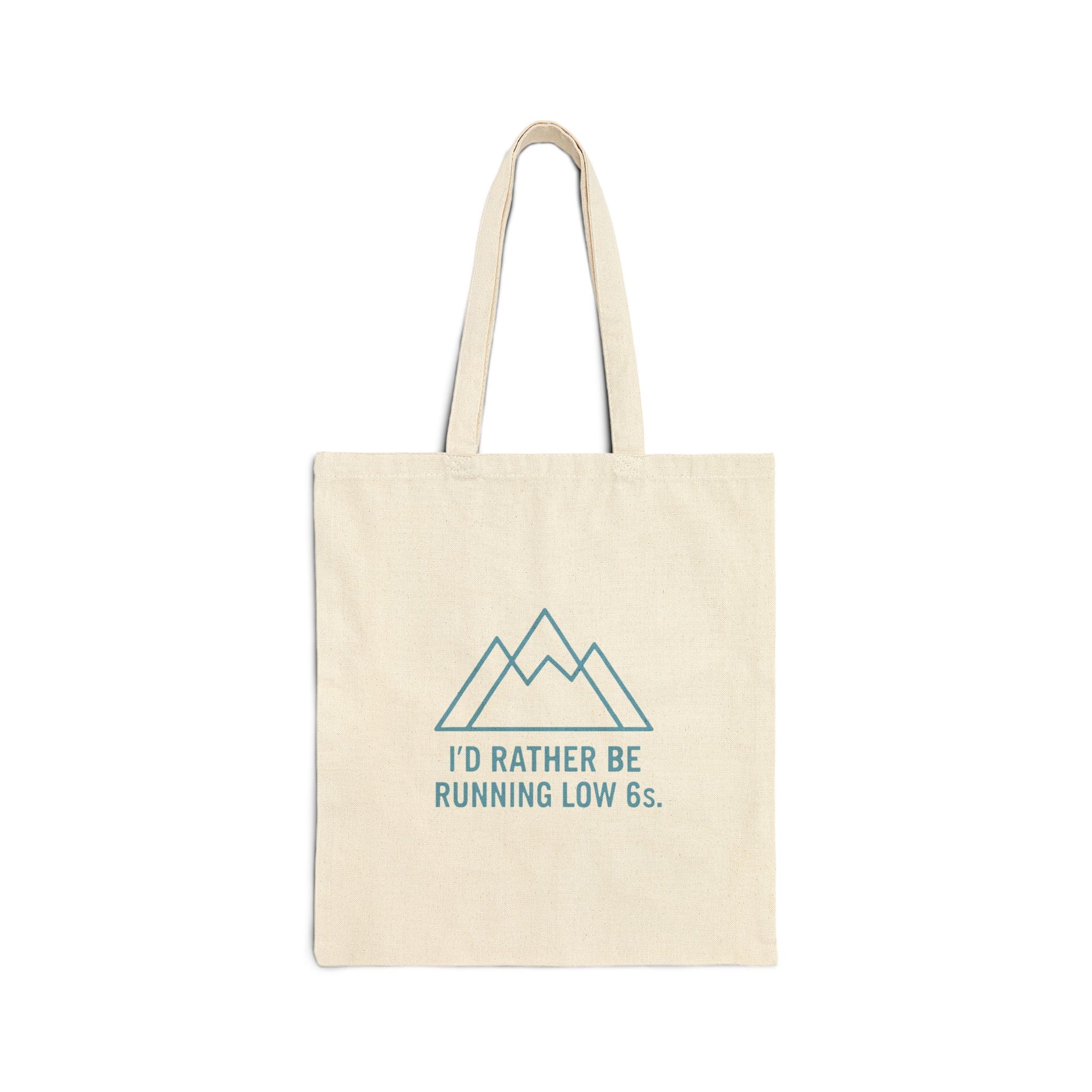 Beige tote bag with blue mountain graphic and text 'I'd rather be running low 6s' on a white background