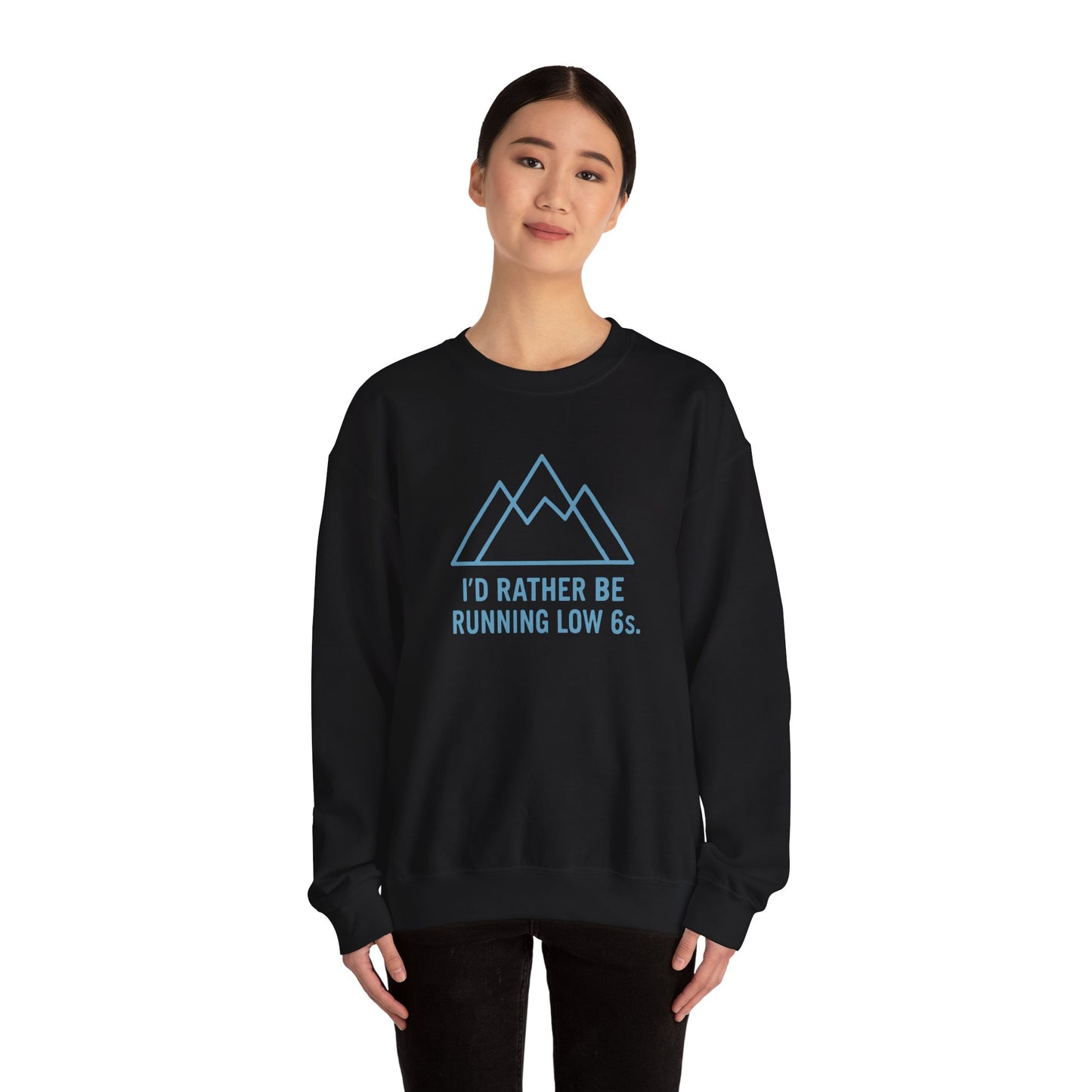 Person wearing a black sweatshirt with blue mountain graphic and text 'I'd rather be running low 6s' on a white background