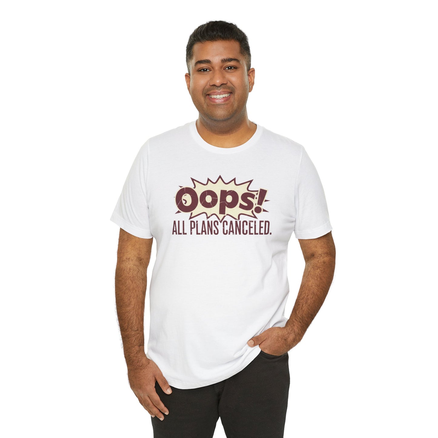 Man wearing a white t-shirt with 'Oops! All plans canceled.' text on a white background