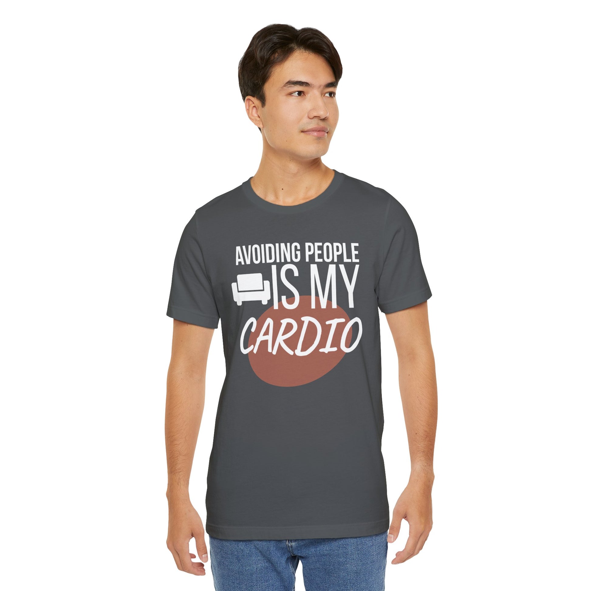 Man wearing a gray t-shirt with humorous text   'Avoiding People Is My Cardio' design on a white background