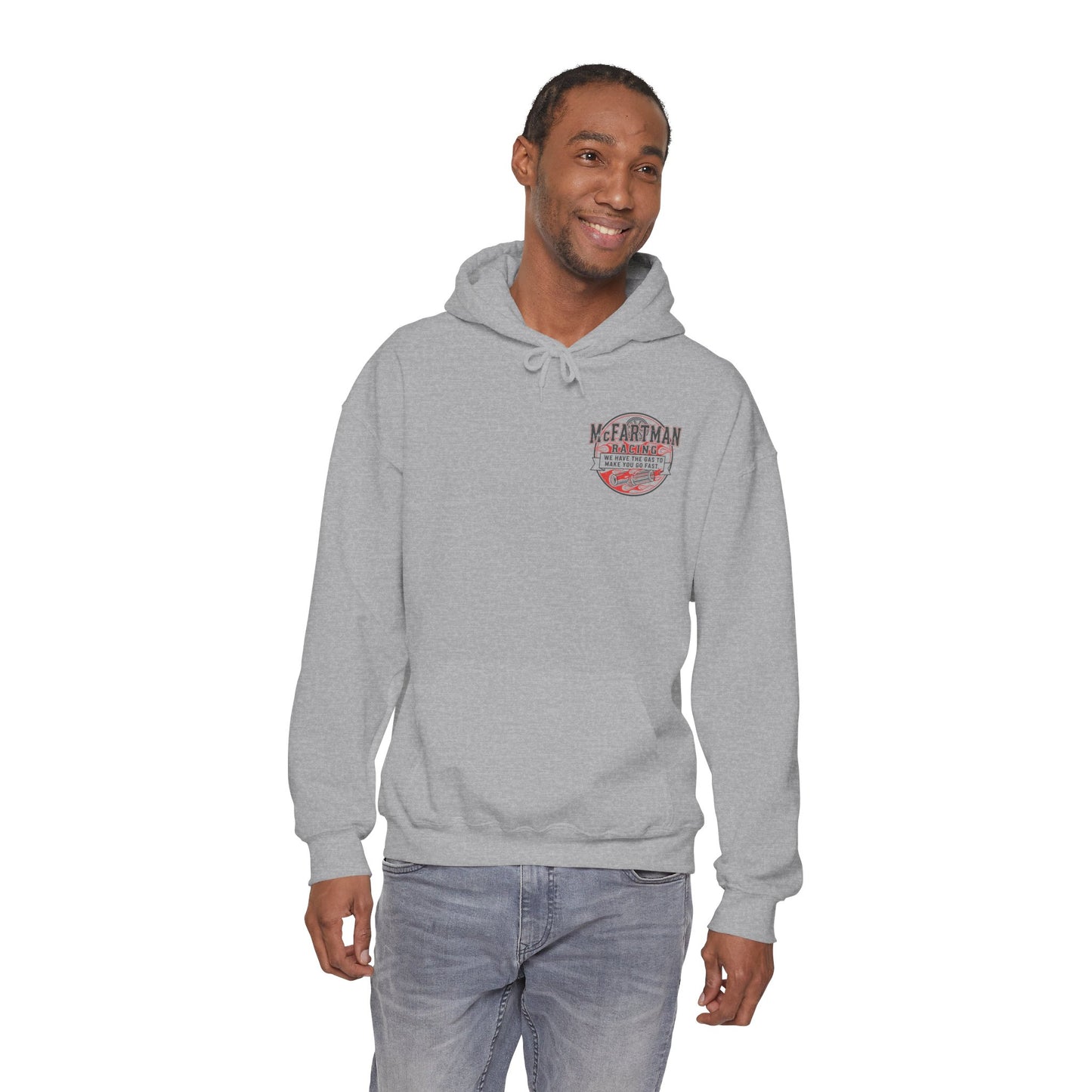 Man wearing a gray hoodie with a logo McFartman Racing We have the gas to make you go fast on a white background
