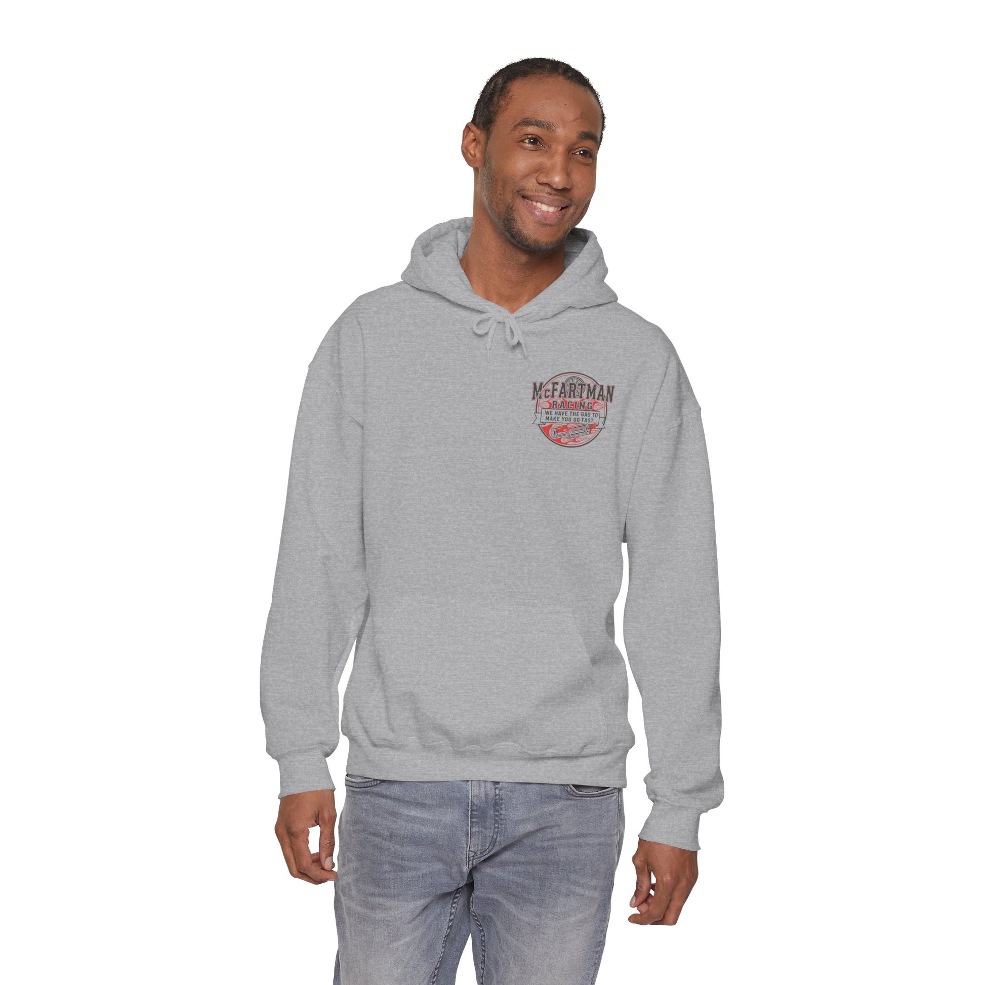 Man wearing a gray hoodie with a logo McFartman Racing We have the gas to make you go fast on a white background
