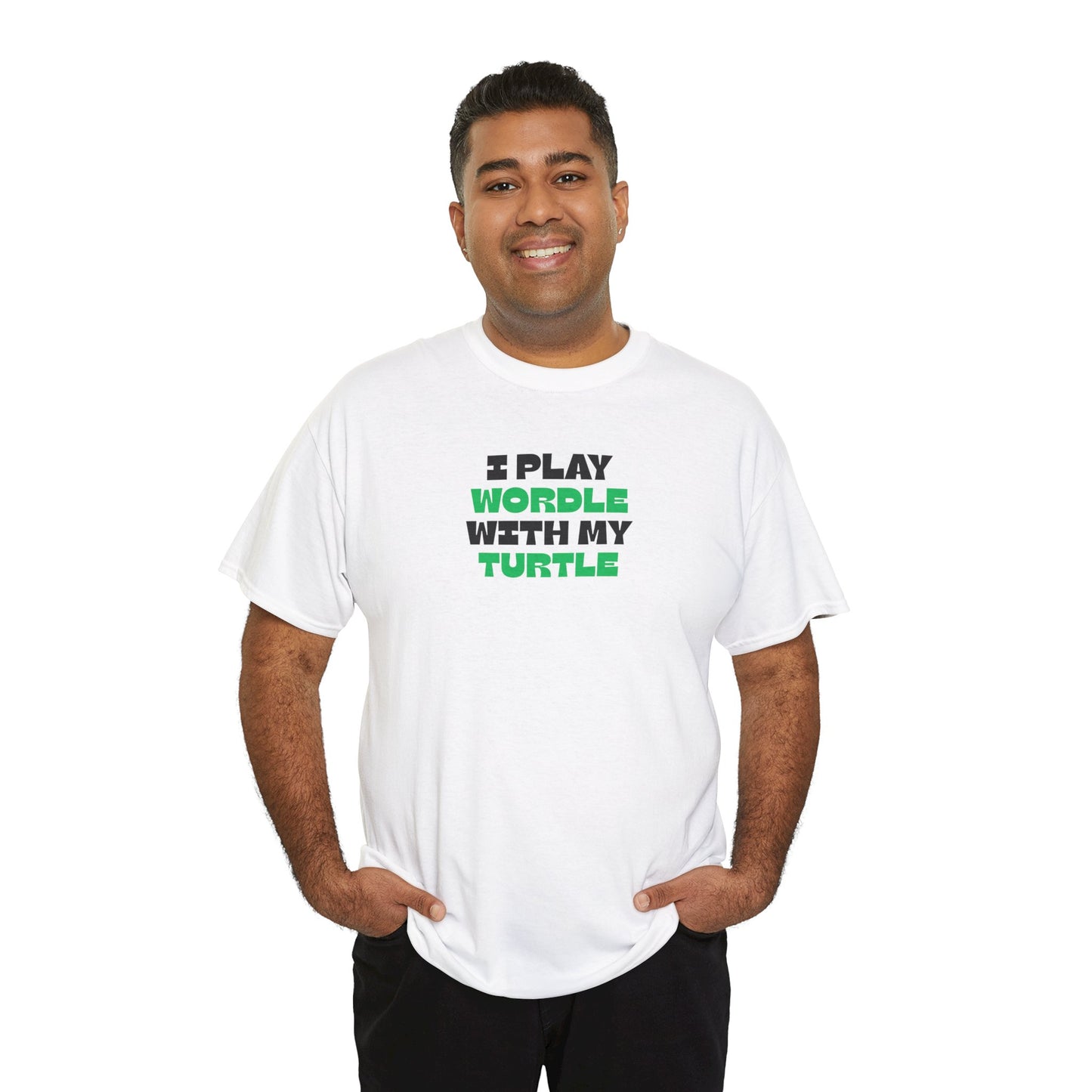 Man wearing a white t-shirt with green text 'I play wordle with my turtle' on a white background