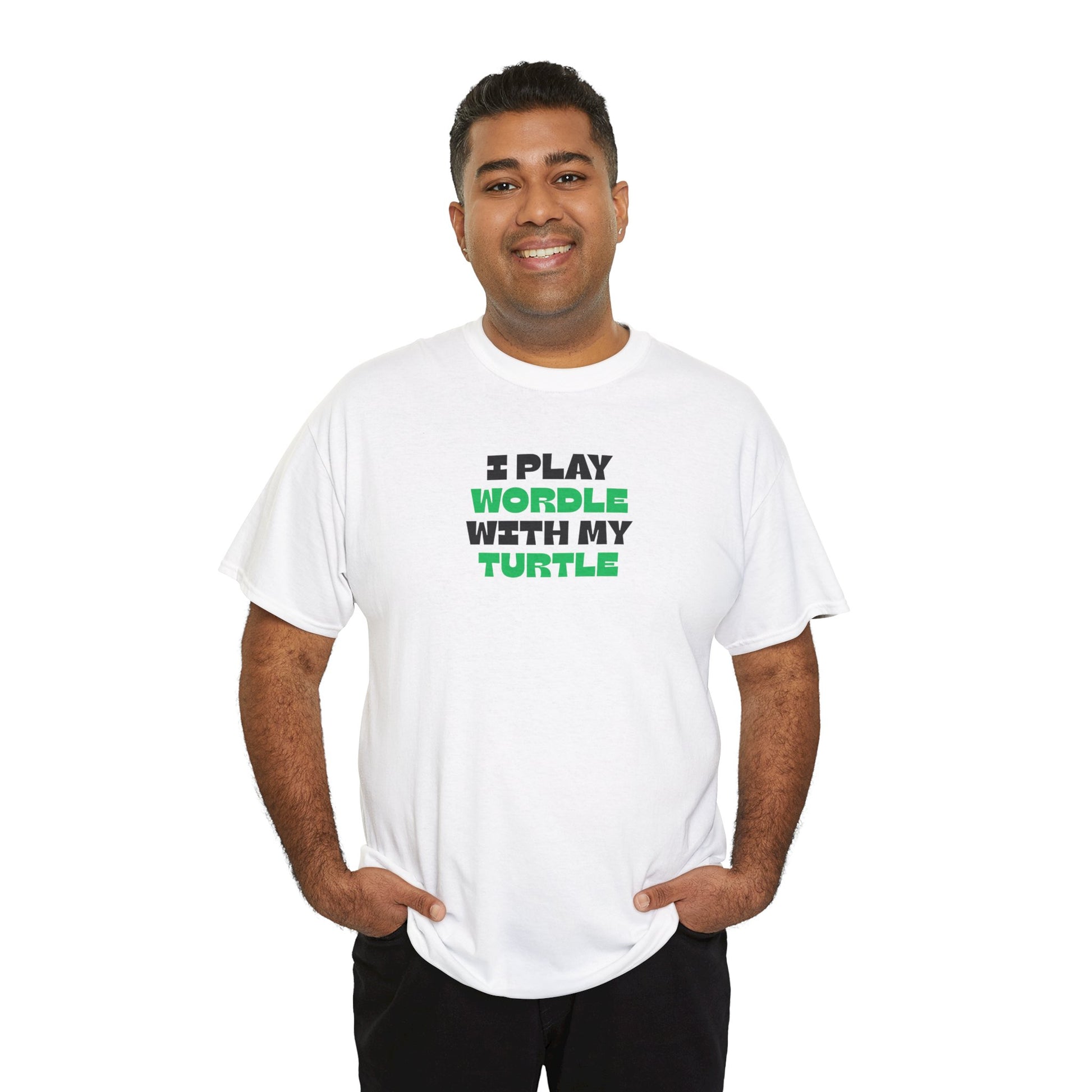 Man wearing a white t-shirt with green text 'I play wordle with my turtle' on a white background