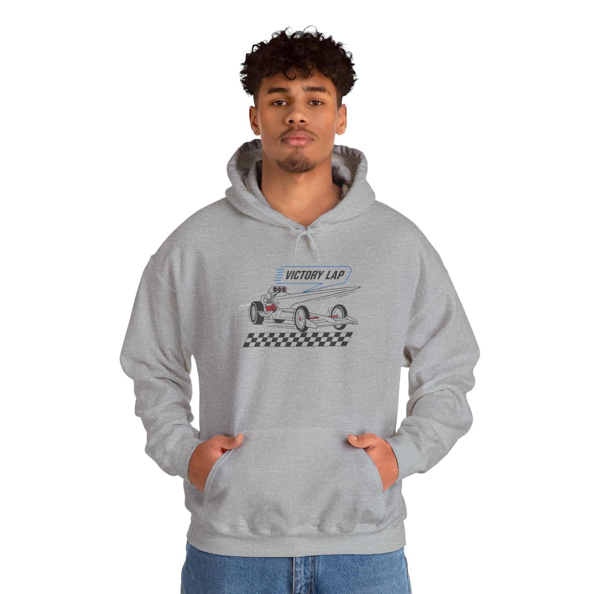 Person wearing a gray hoodie with a graphic design and text 'VICTORY LAP' on a white background