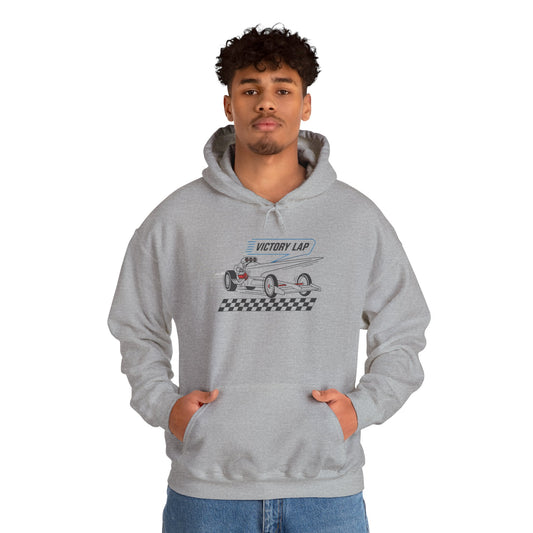 Person wearing a gray hoodie with a graphic design and text 'VICTORY LAP' on a white background