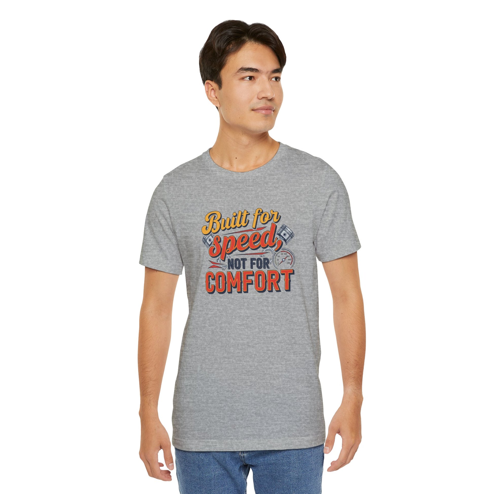 Man wearing a gray t-shirt with colorful text design on a white background
