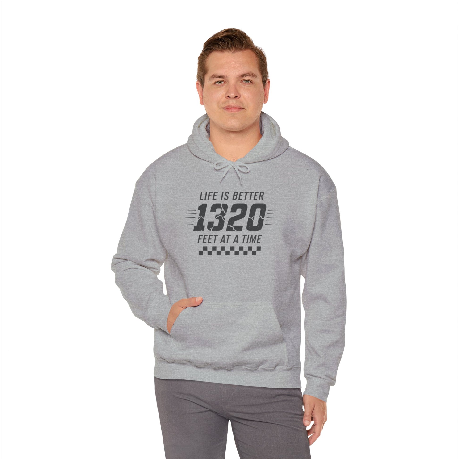 Man wearing a gray hoodie with text 'Life is better 1320 feet at a time' on a white background
