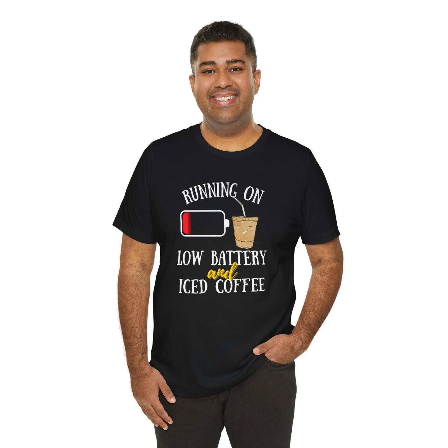 Man wearing a black t-shirt with a coffee-themed graphic and text 'Running on low battery and iced coffee'.