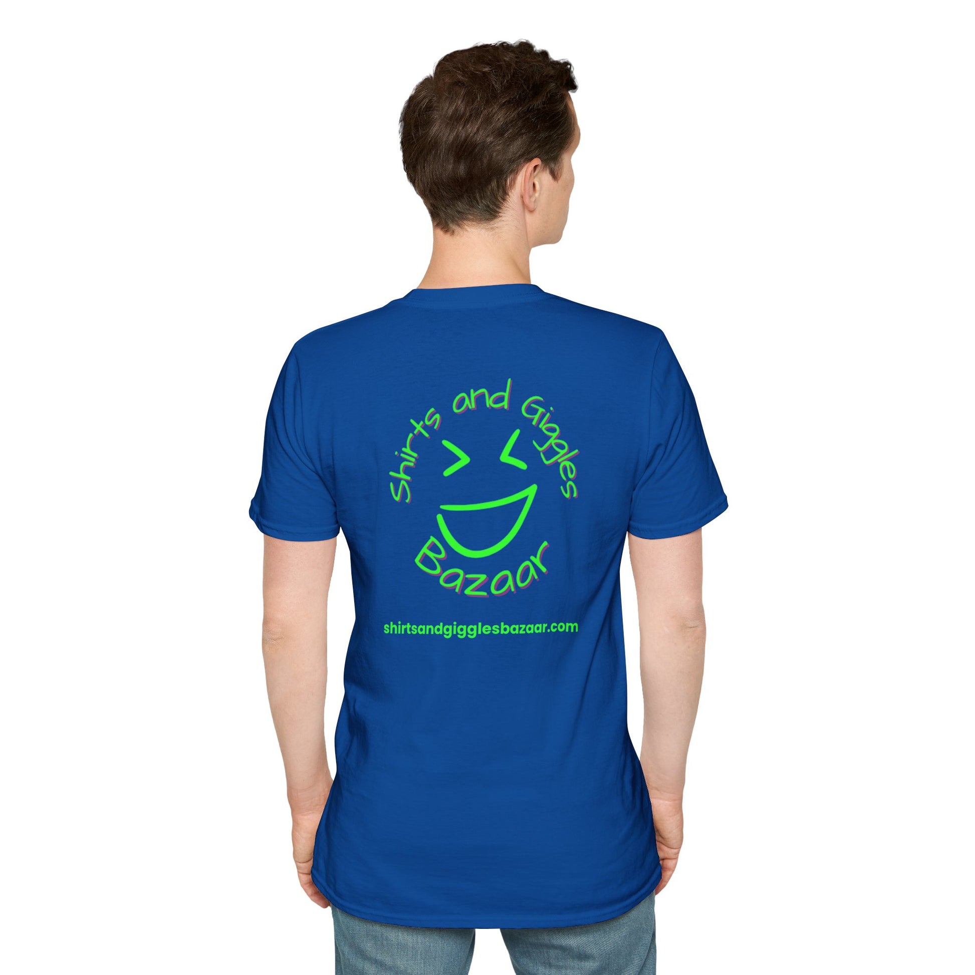 Person wearing a blue t-shirt with green  'Shirts and Giggles Bazaar' text and logo on the back, on a white background