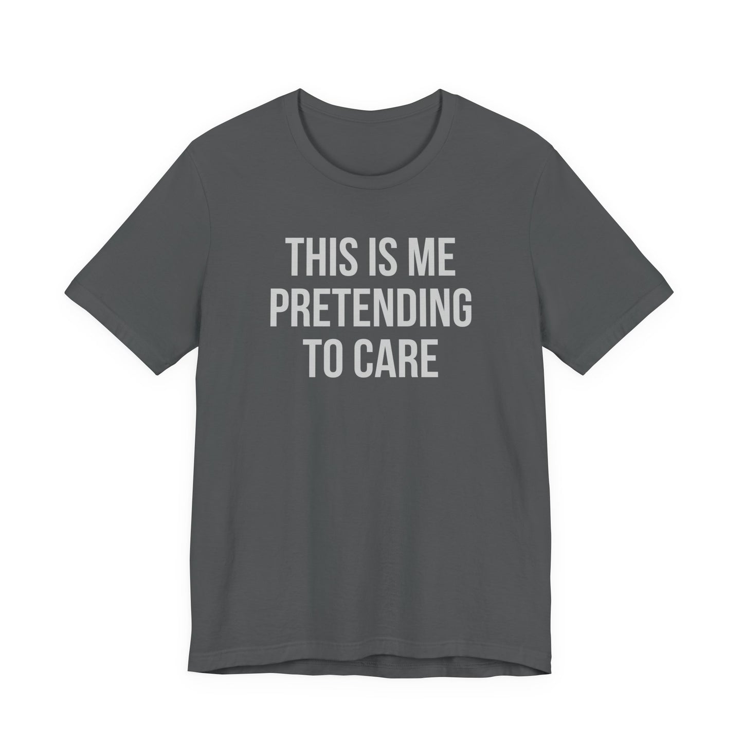 Gray t-shirt with white text 'THIS IS ME PRETENDING TO CARE' on a white background