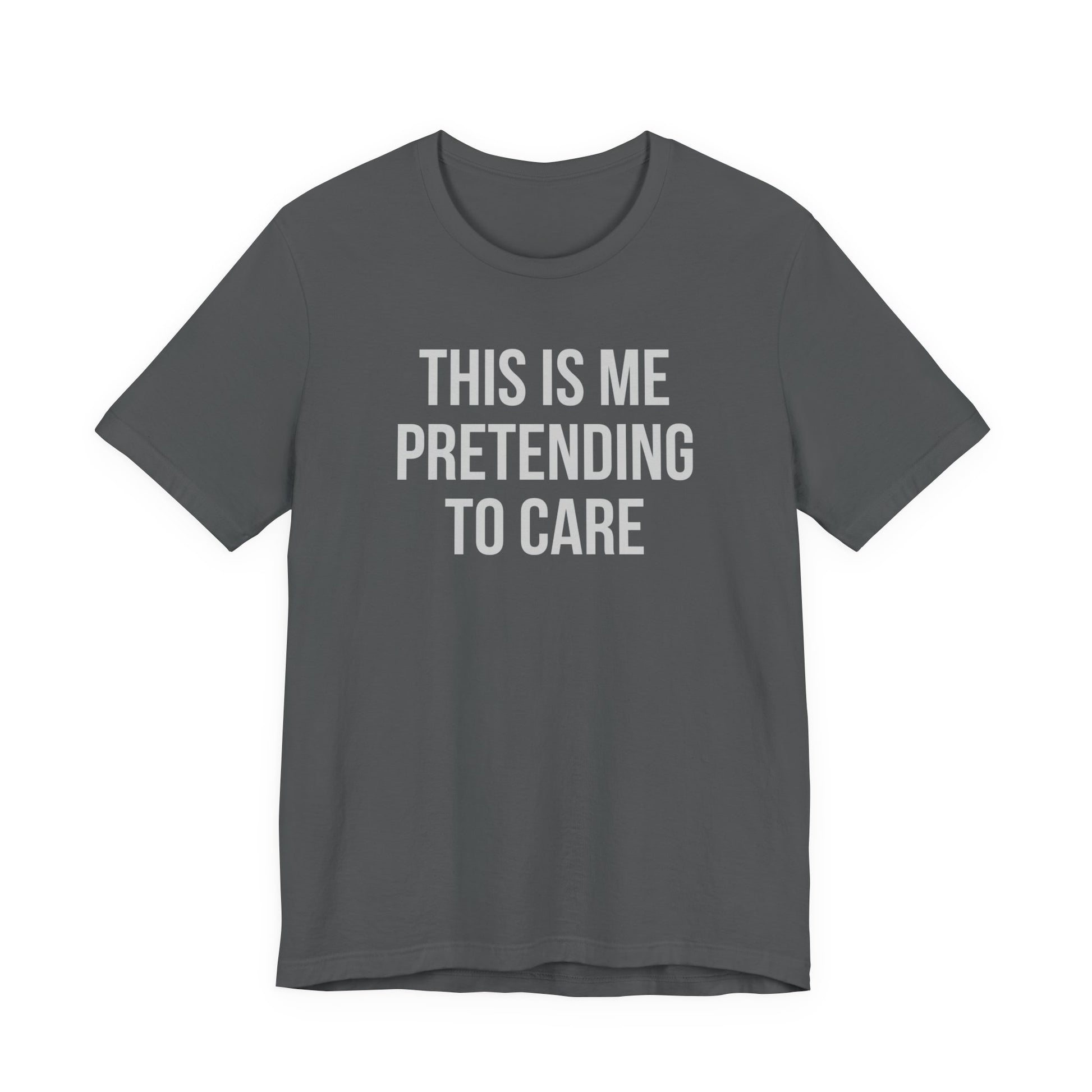 Gray t-shirt with white text 'THIS IS ME PRETENDING TO CARE' on a white background