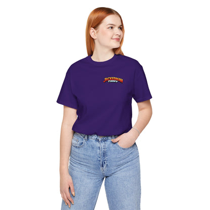 Person wearing a purple t-shirt with a 'Jackedman Timmy' logo on a white background