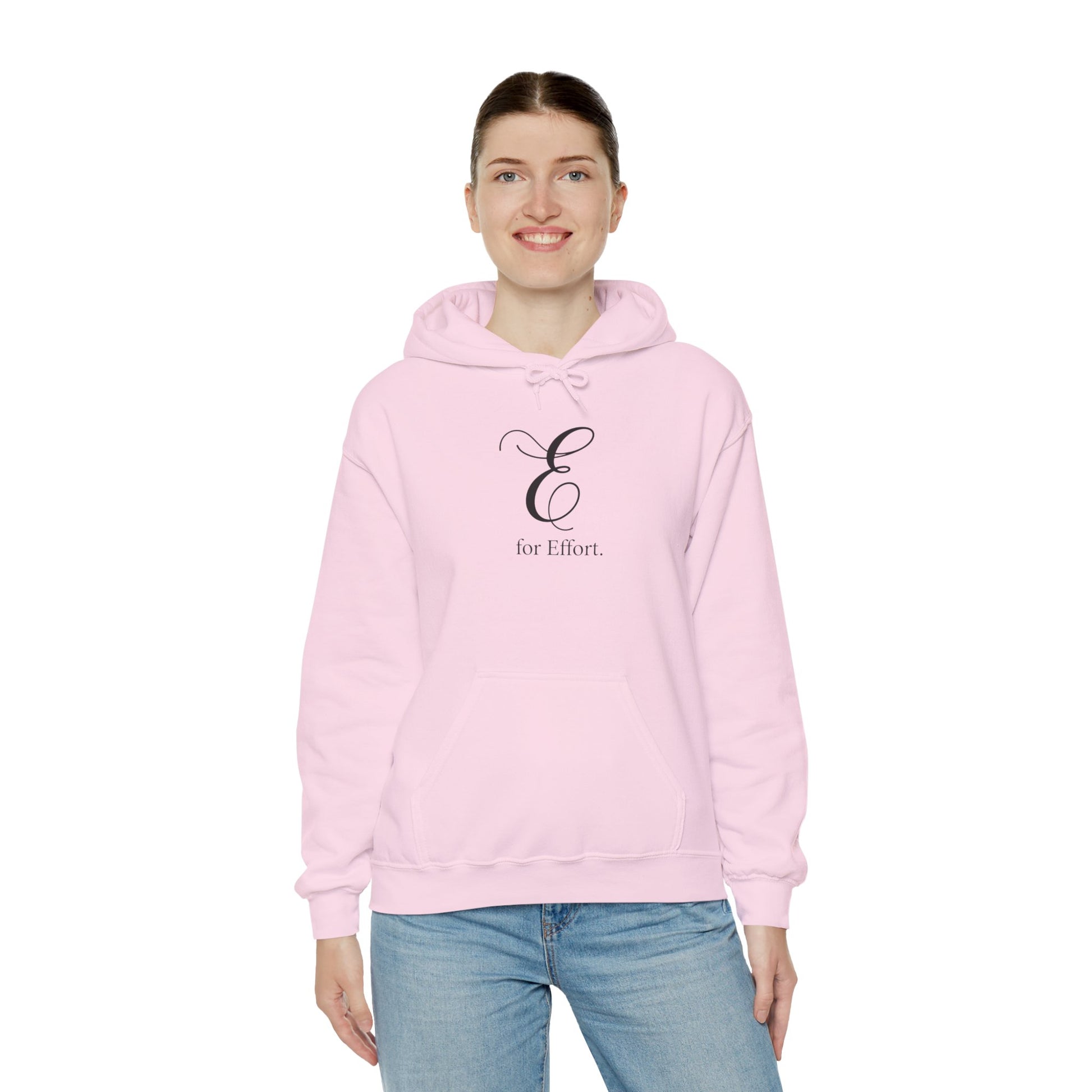 Person wearing a pink hoodie with a logo and text 'E for Effort' on a white background