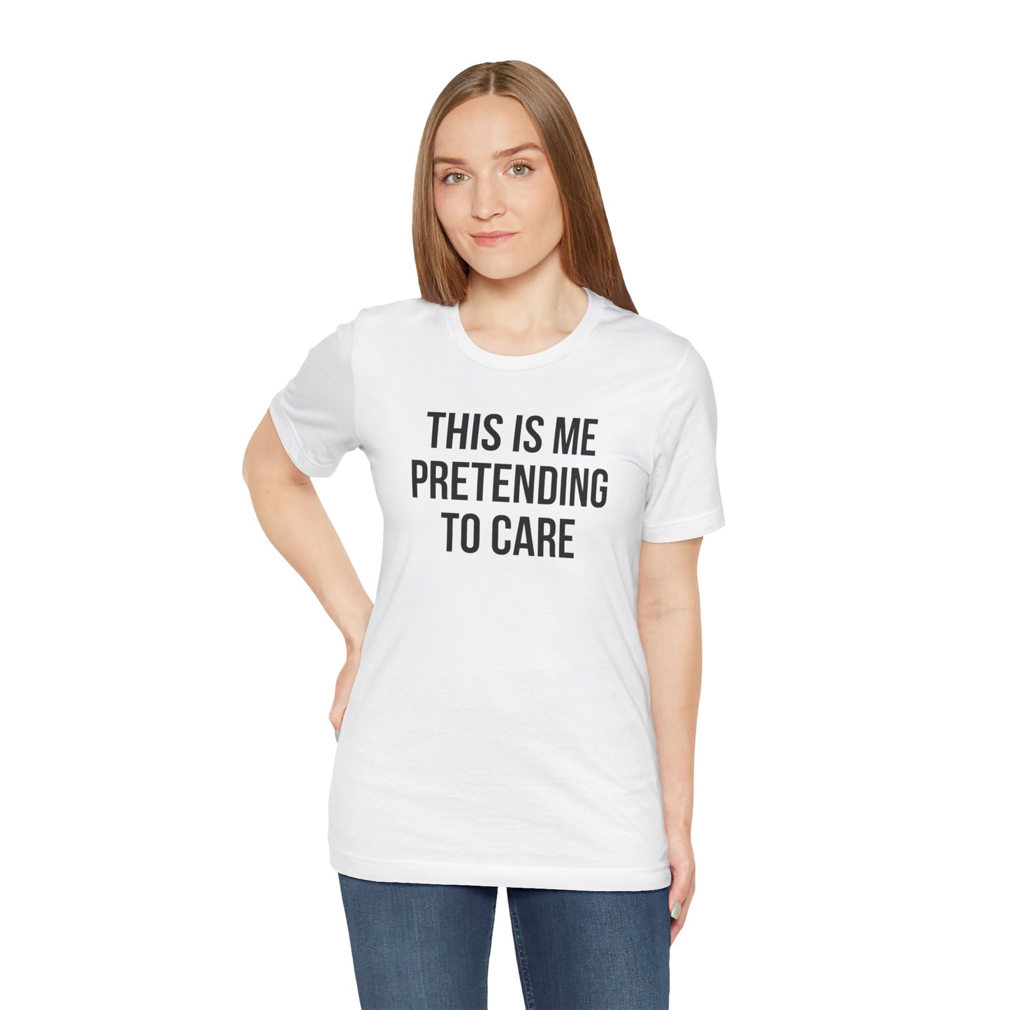 Woman wearing a white t-shirt with text 'This is me pretending to care' on a white background