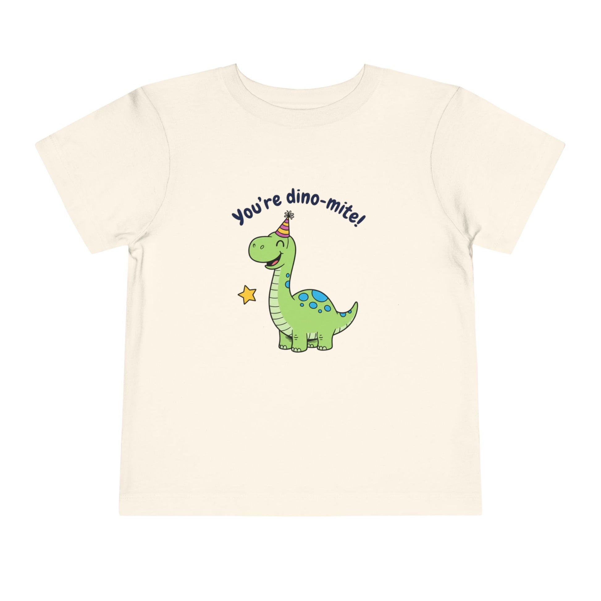 Beige t-shirt with a cartoon dinosaur and text on a white background