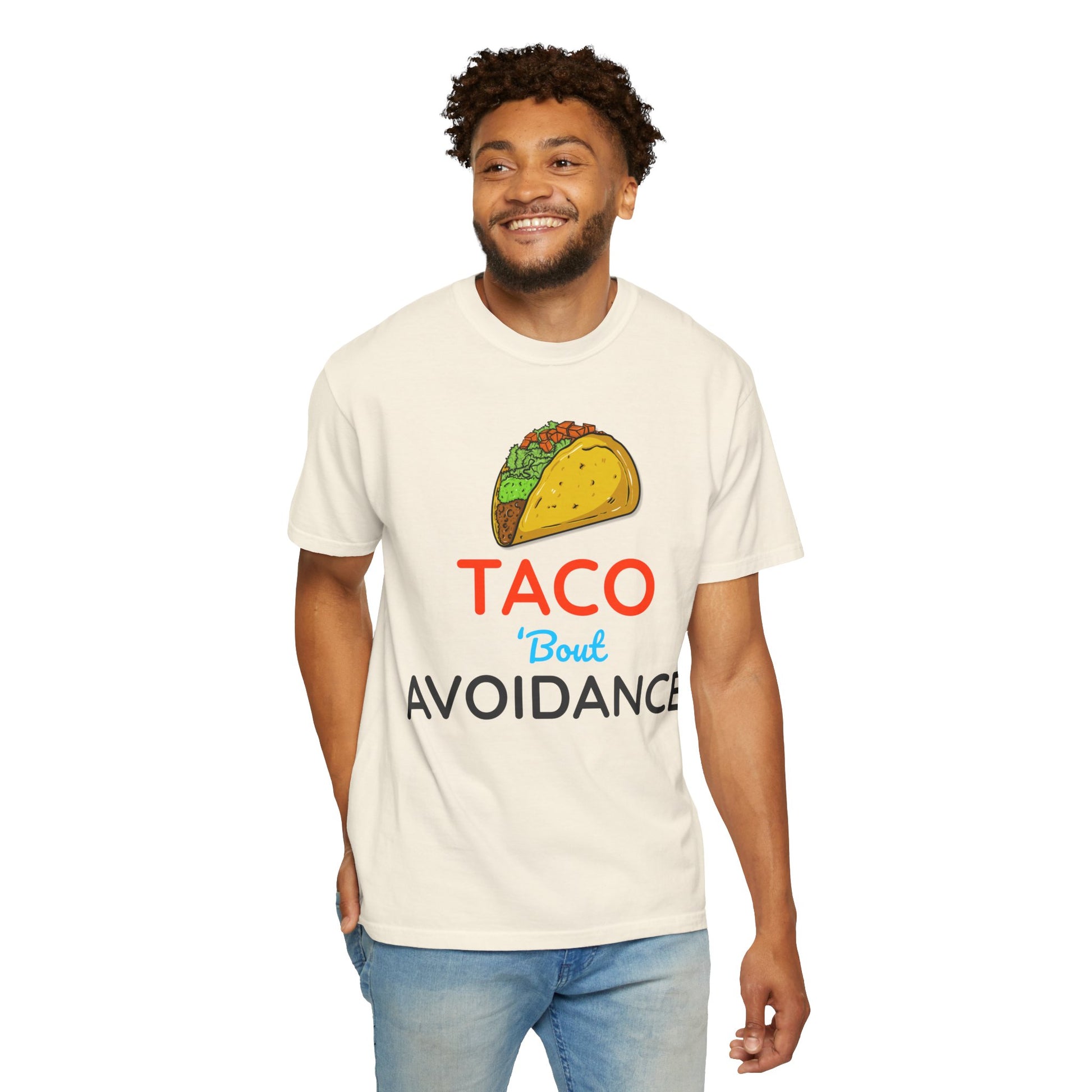 Man wearing a white t-shirt with a taco graphic and text 'Taco 'bout avoidance' on a white background