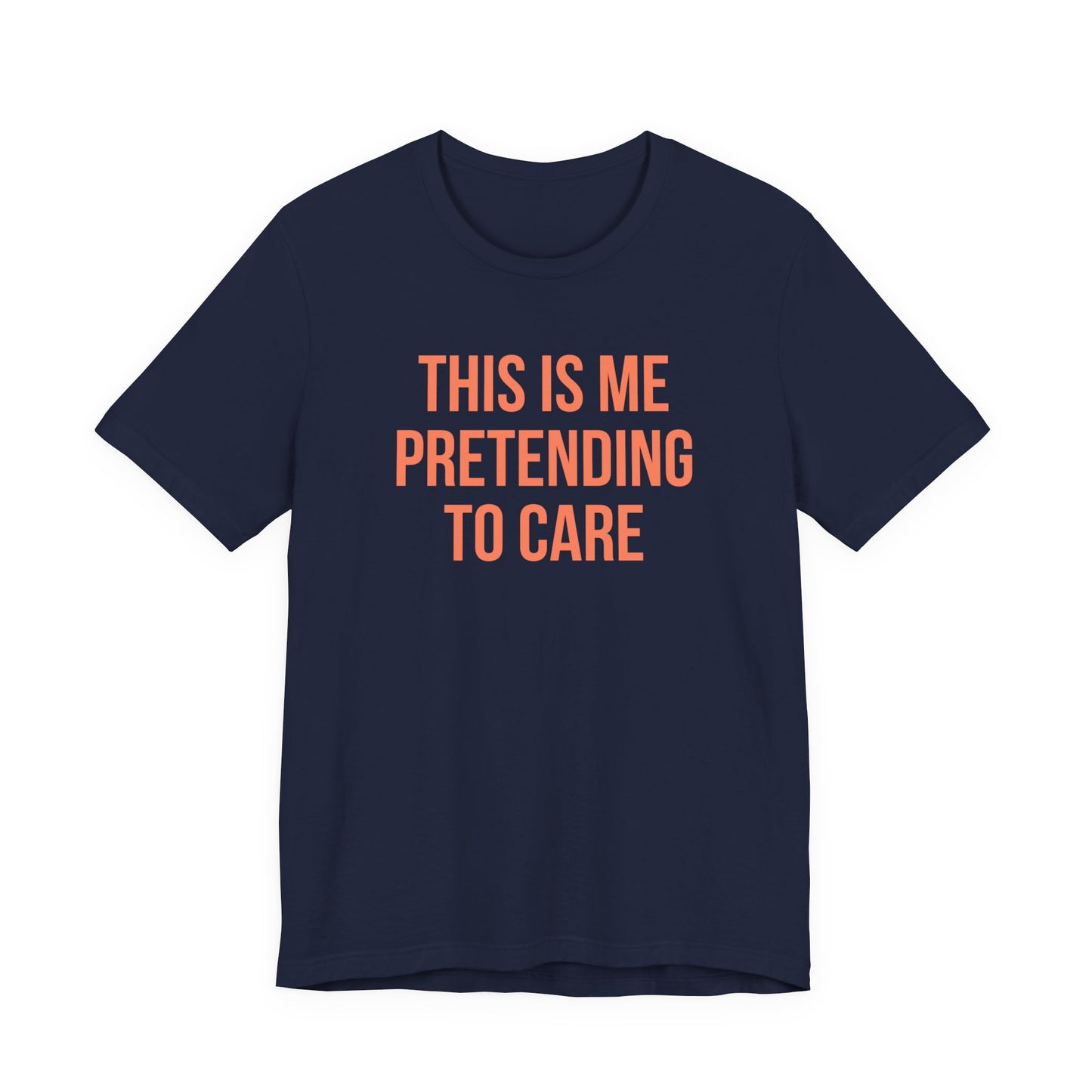 Navy blue t-shirt with orange text 'THIS IS ME PRETENDING TO CARE' on a white background