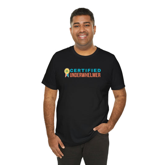 Man wearing a black t-shirt with 'Certified Underwhelmer' text on a white background
