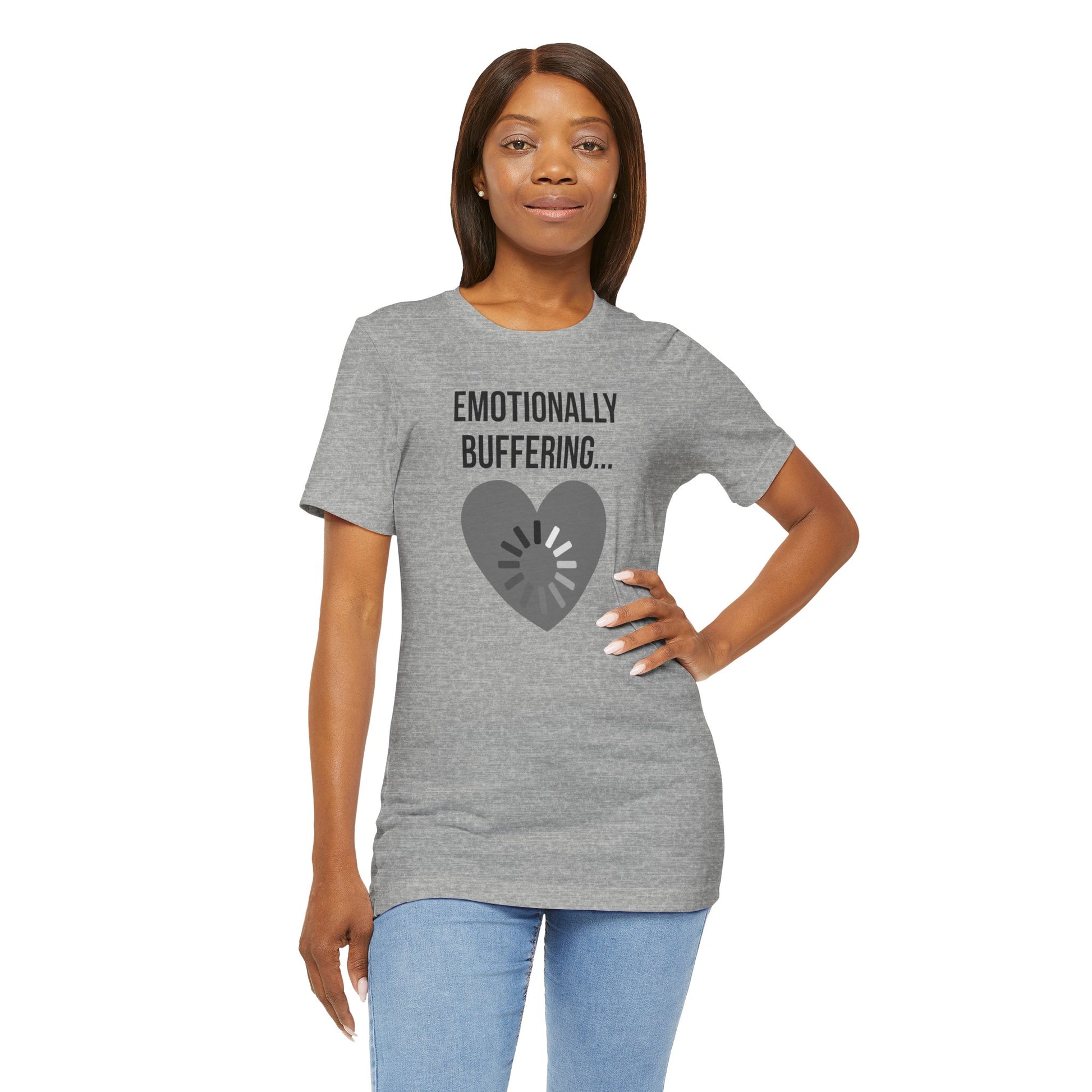 Woman wearing a gray t-shirt with 'Emotionally Buffering' text and heart graphic on a white background