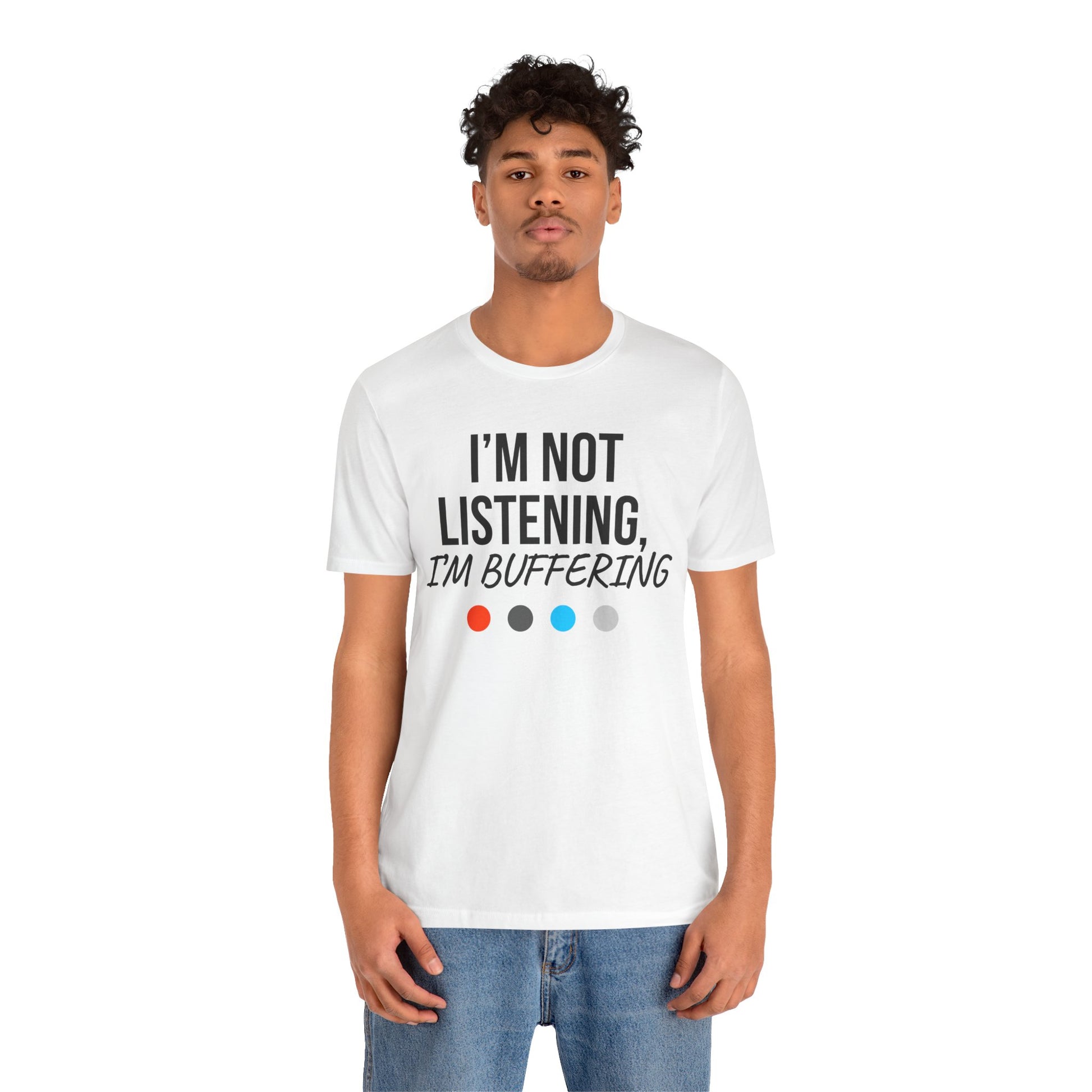 Person wearing a white t-shirt with 'I'm Not Listening, I'm Buffering' text on a white background