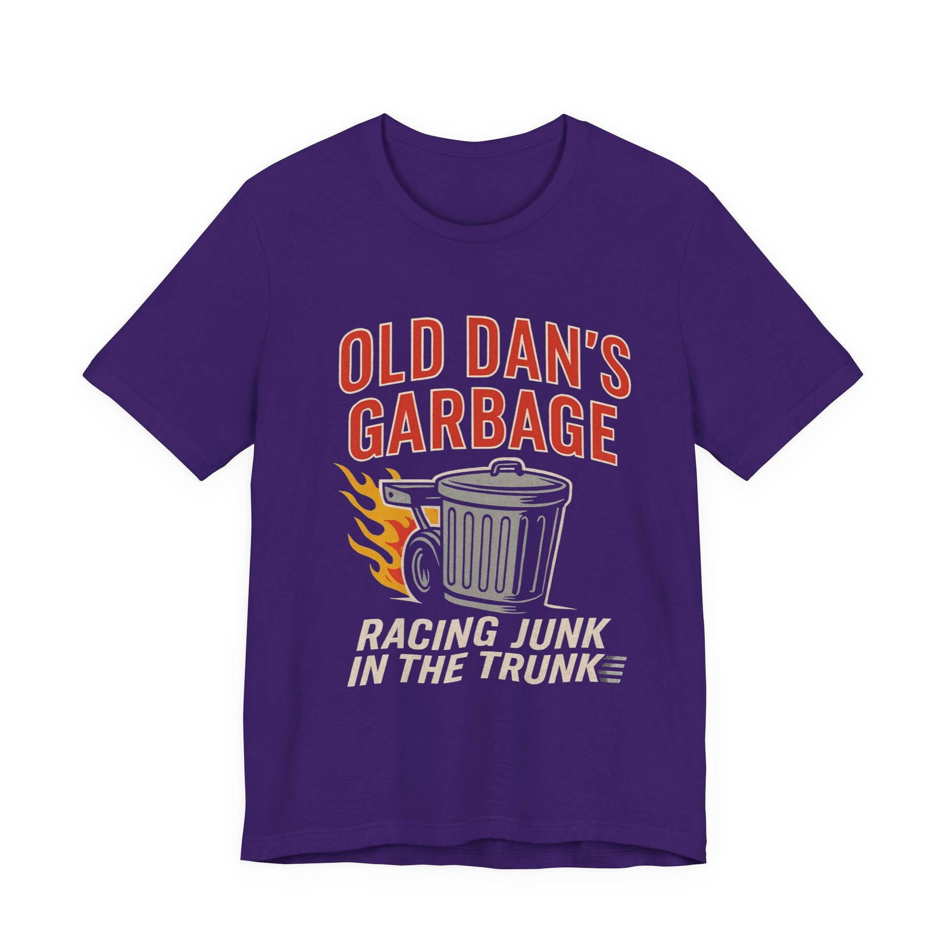 Purple T‑shirt with bold red and white text “Old Dan’s Garbage” above a flaming silver garbage can illustration, and the tagline “Racing Junk in the Trunk” below. Funny drag racing parody shirt with retro hot rod flames and humor‑driven racing style, perfect for car enthusiasts, gearheads, and novelty graphic tee fans.
