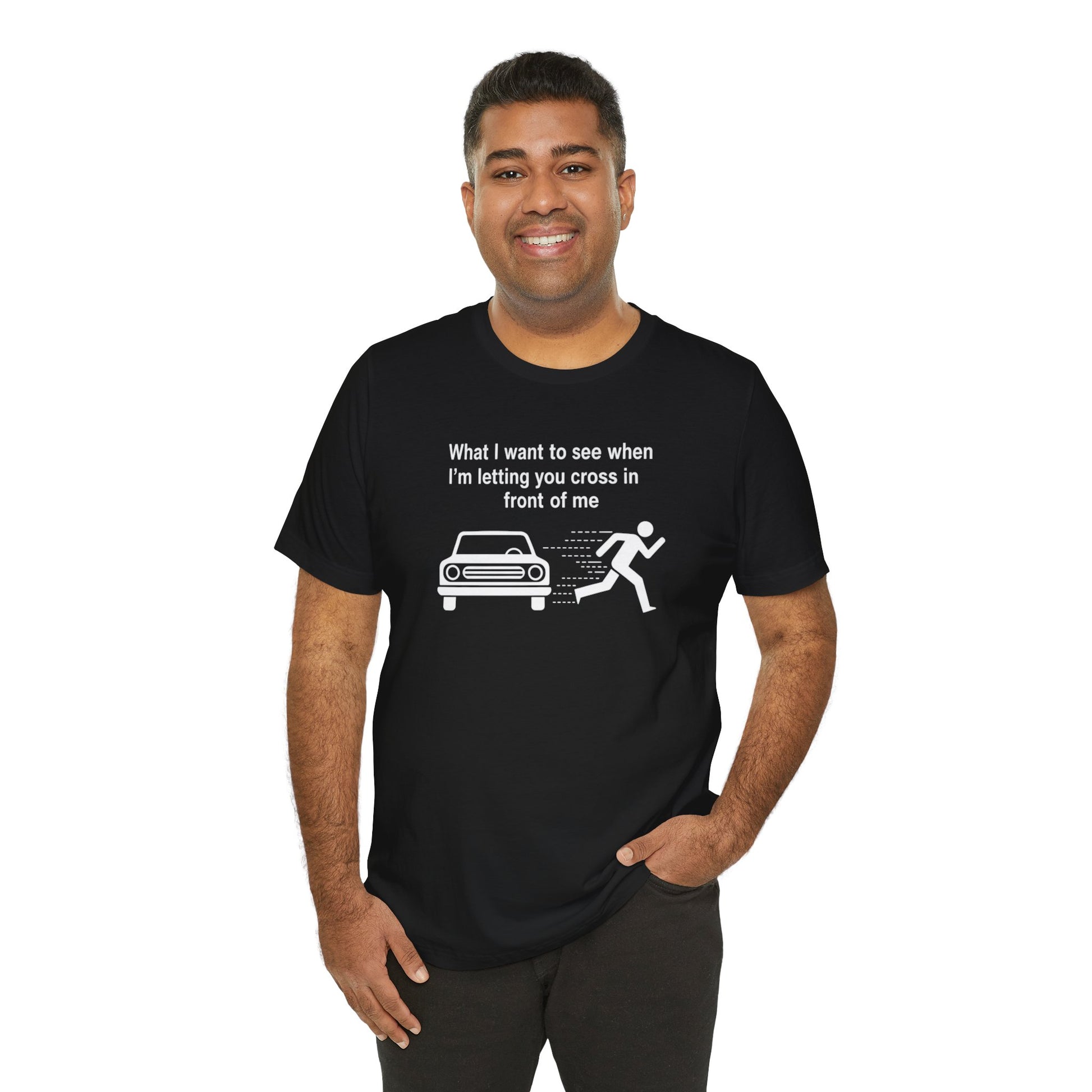 Man wearing a black t-shirt with a graphic and text 'What I want to see when I'm letting you cross in front of me' on a white background