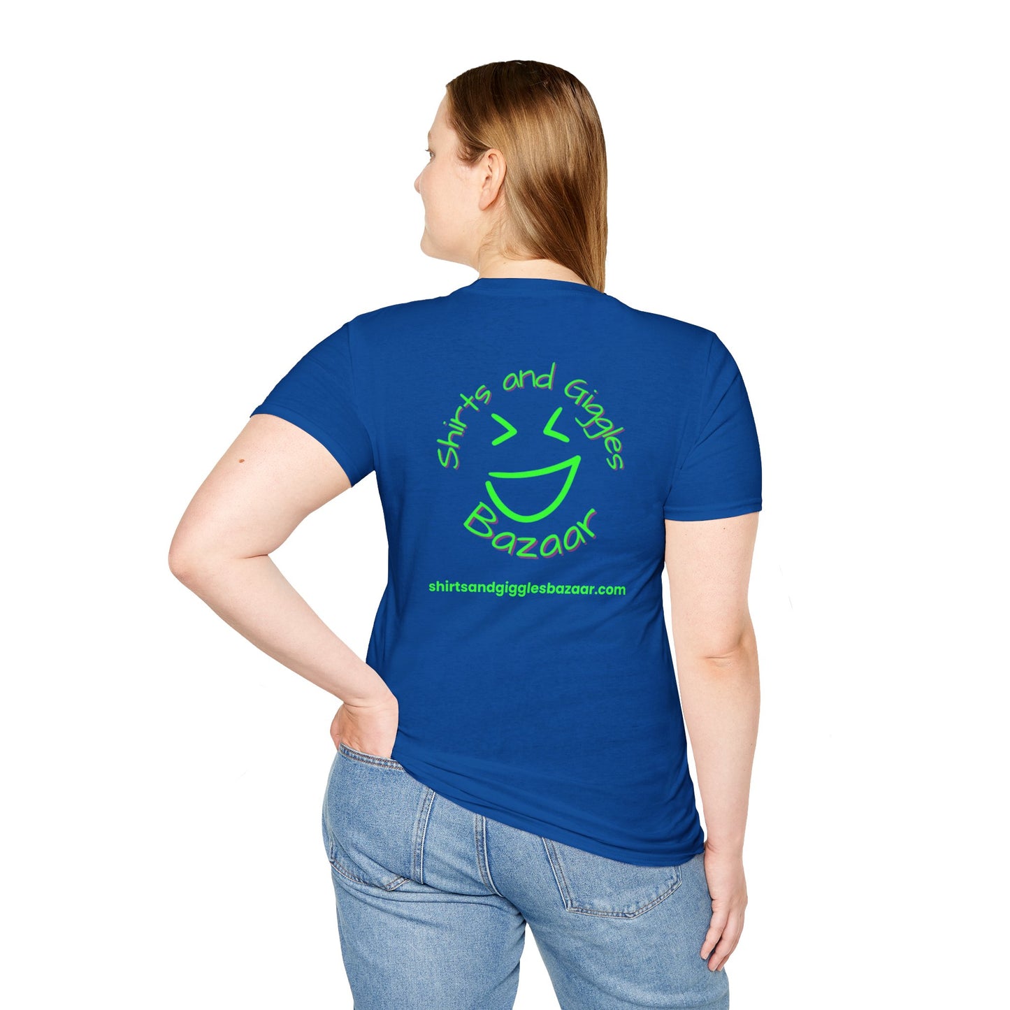 Person wearing a blue t-shirt with green text 'Shirts and Giggles Bazaar' and logo on the back, standing against a white background.