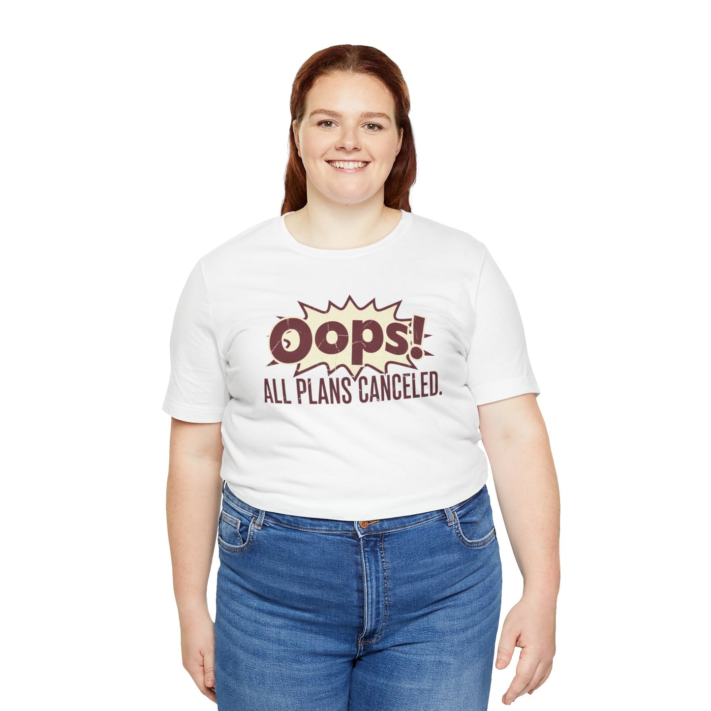 Person wearing a white t-shirt with 'Oops! All Plans Canceled' text on a white background