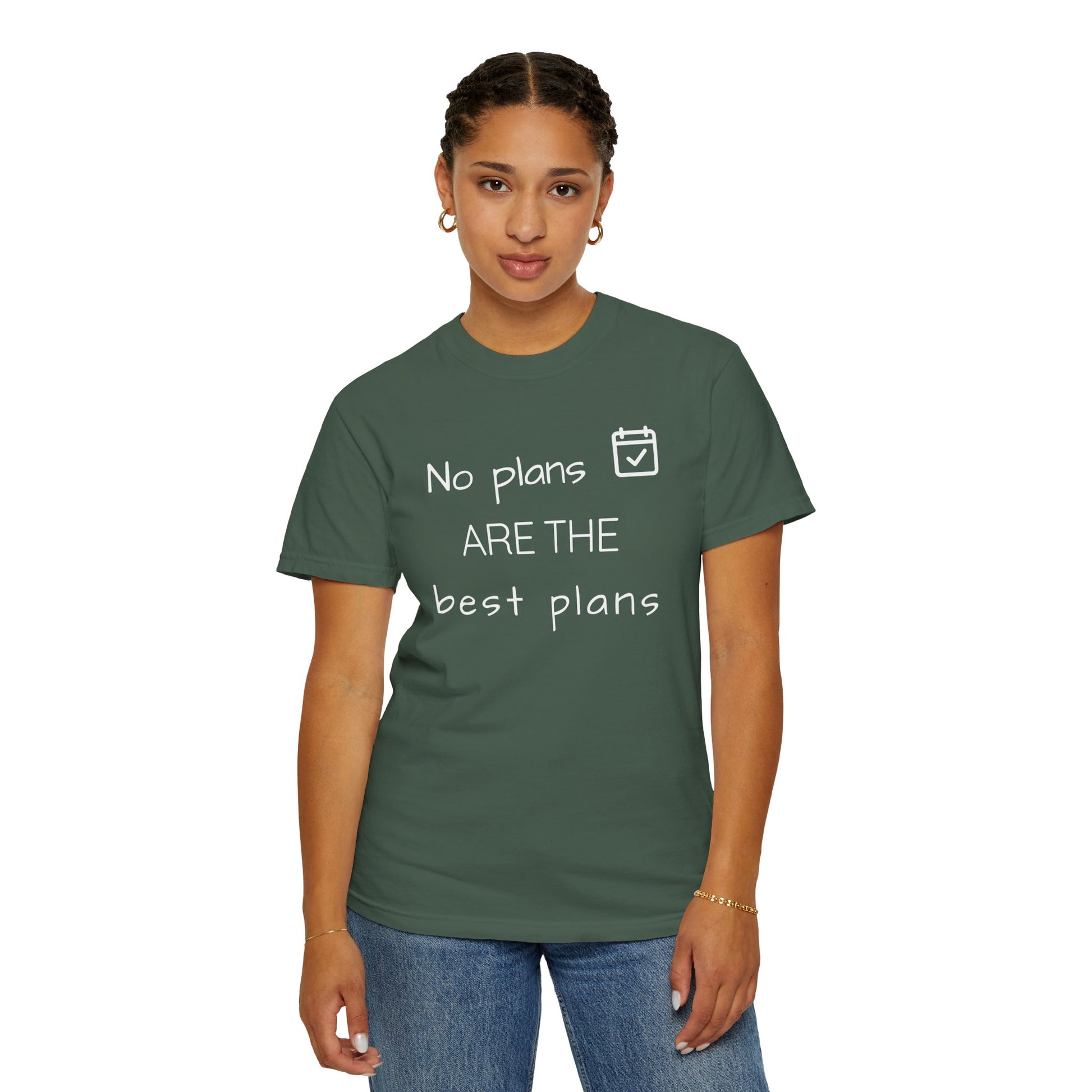 Person wearing a green t-shirt with text 'No plans ARE THE best plans' on a white background