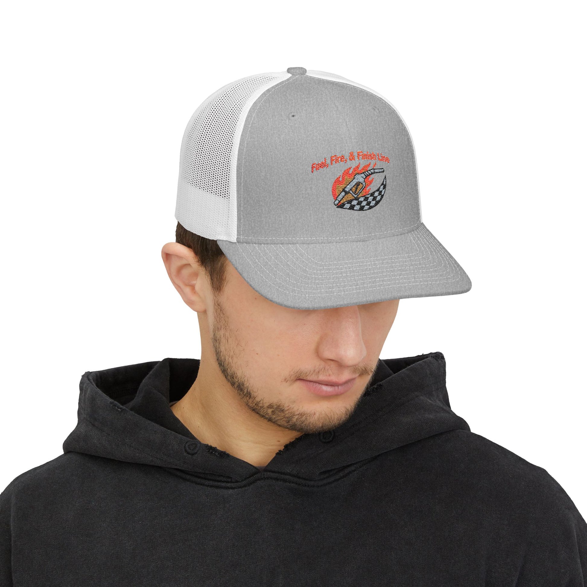 Man wearing a gray and white trucker hat with a logo and text 'Fuel, Fire & Finish Line' on a white background