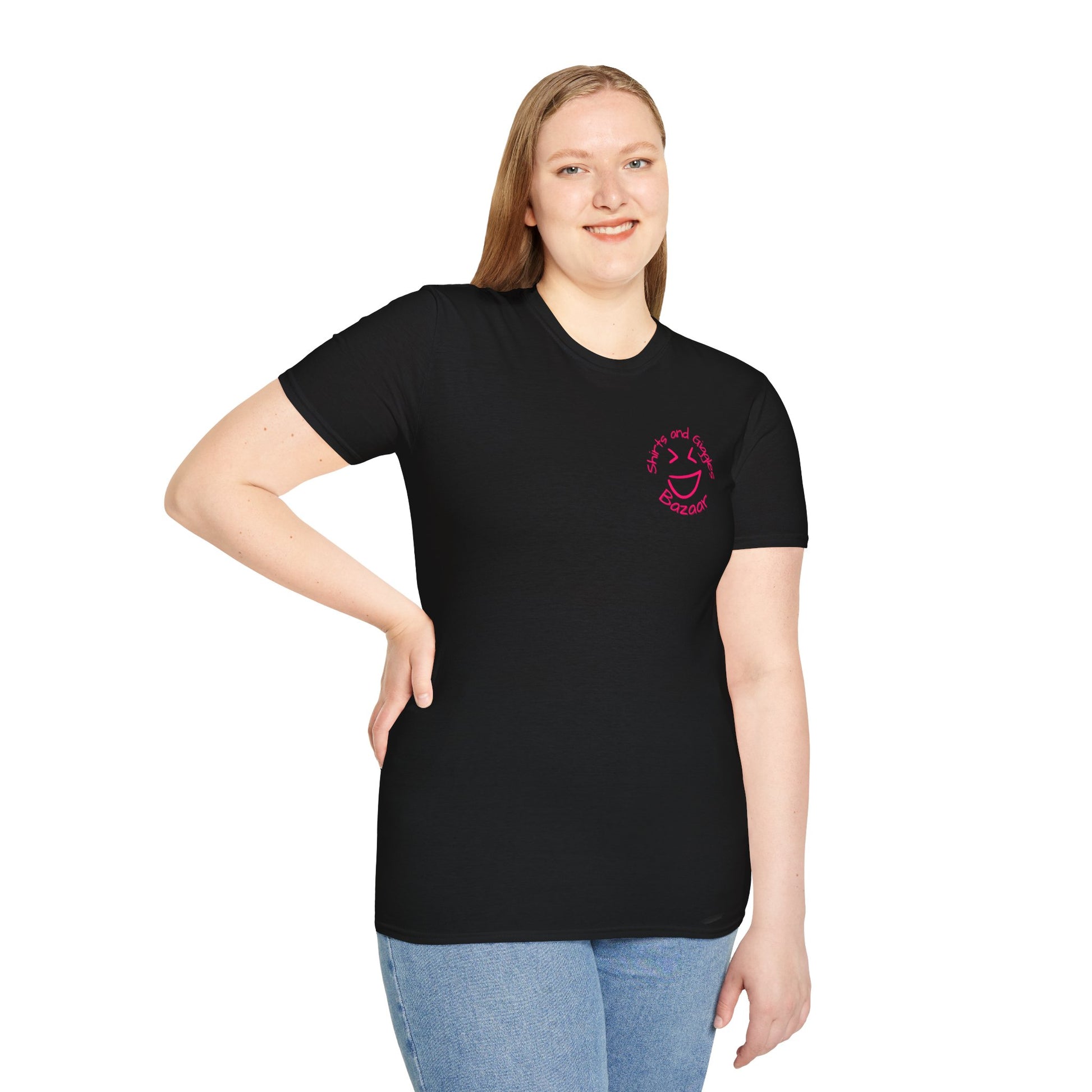 Person wearing a black t-shirt with a pink 'Shirts and Giggles Bazaar' logo