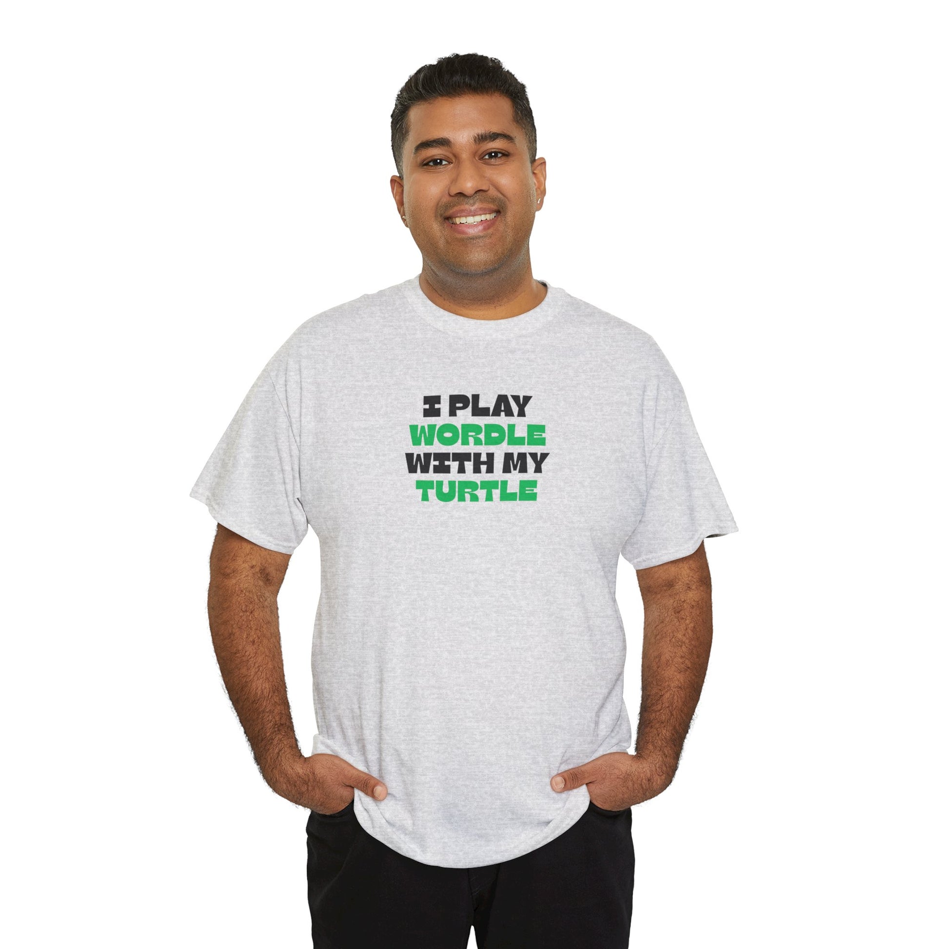 Man wearing a gray t-shirt with text 'I Play Wordle With My Turtle' on a white background
