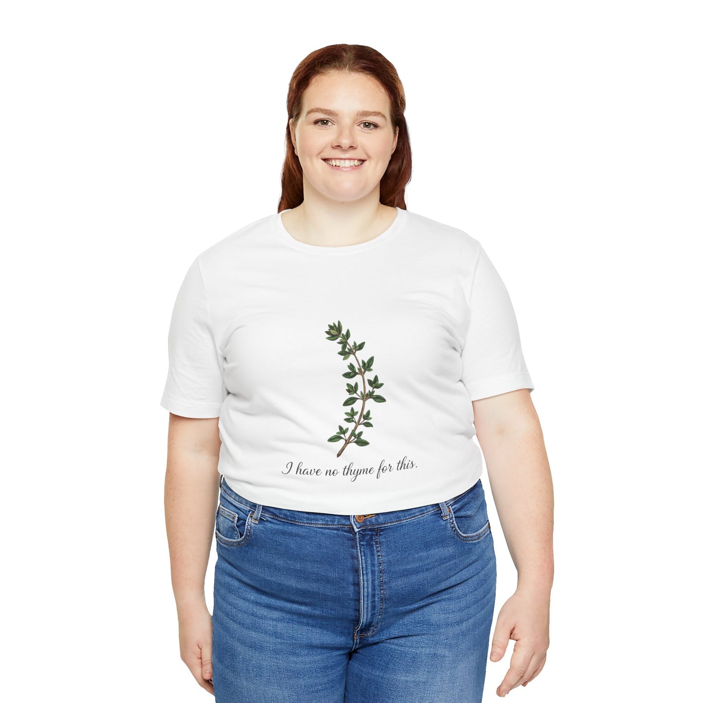 Person wearing a white t-shirt with a plant design and text 'I have not thyme for this' on a white background