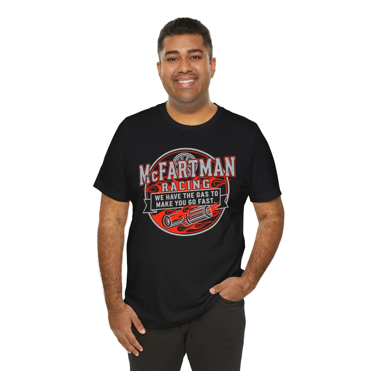 Man wearing a black t-shirt with a racing graphic and text 'McFARTMAN Racing We have the gas to make you go fast' on a white background