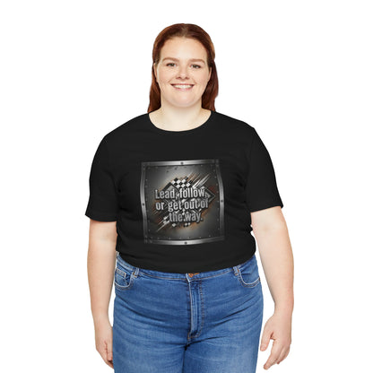Person wearing a black t-shirt with a graphic design and text 'Lead, follow, or get out of the way' on a white background