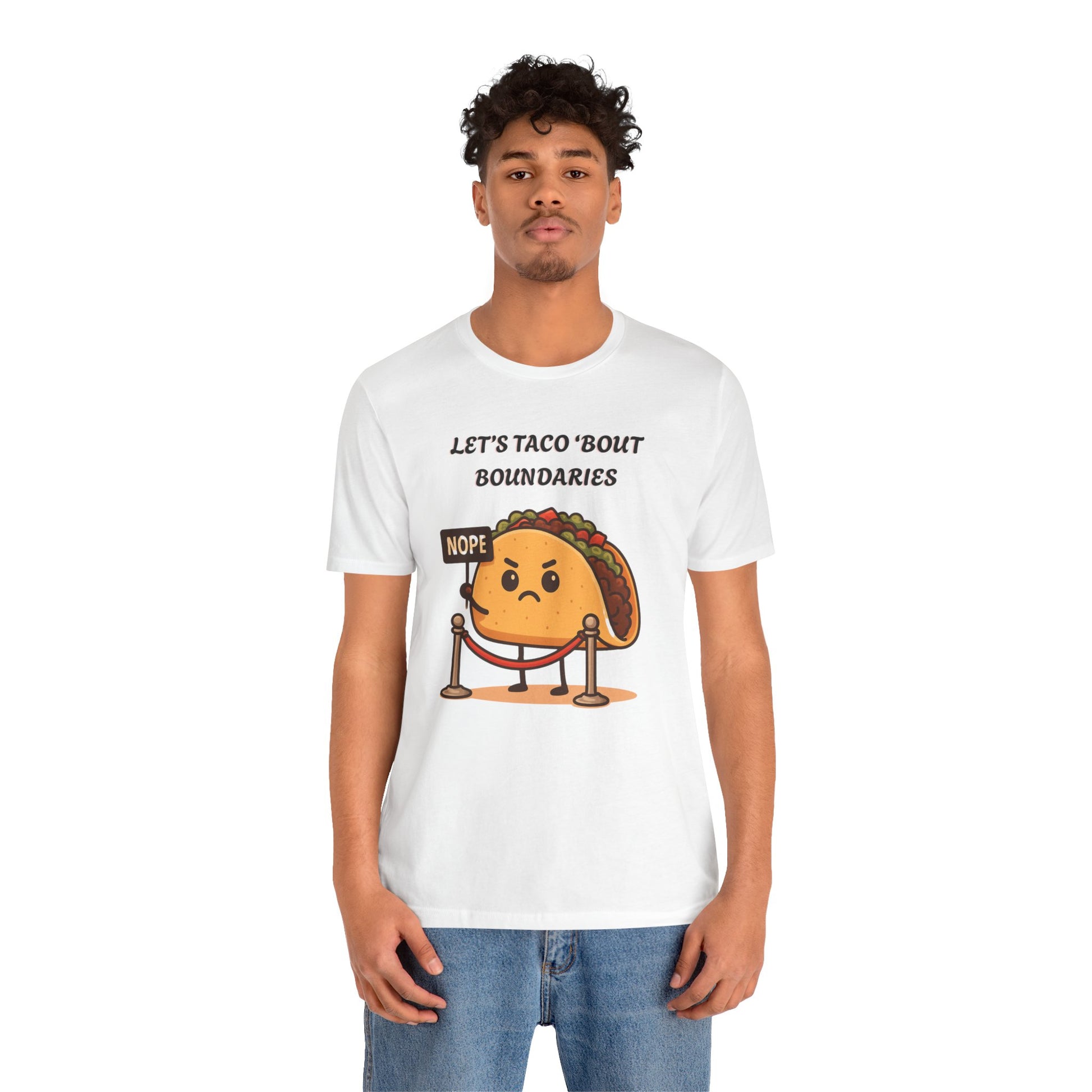 Person wearing a white t-shirt with a taco graphic and text 'Let's taco 'bout boundaries', on a white background