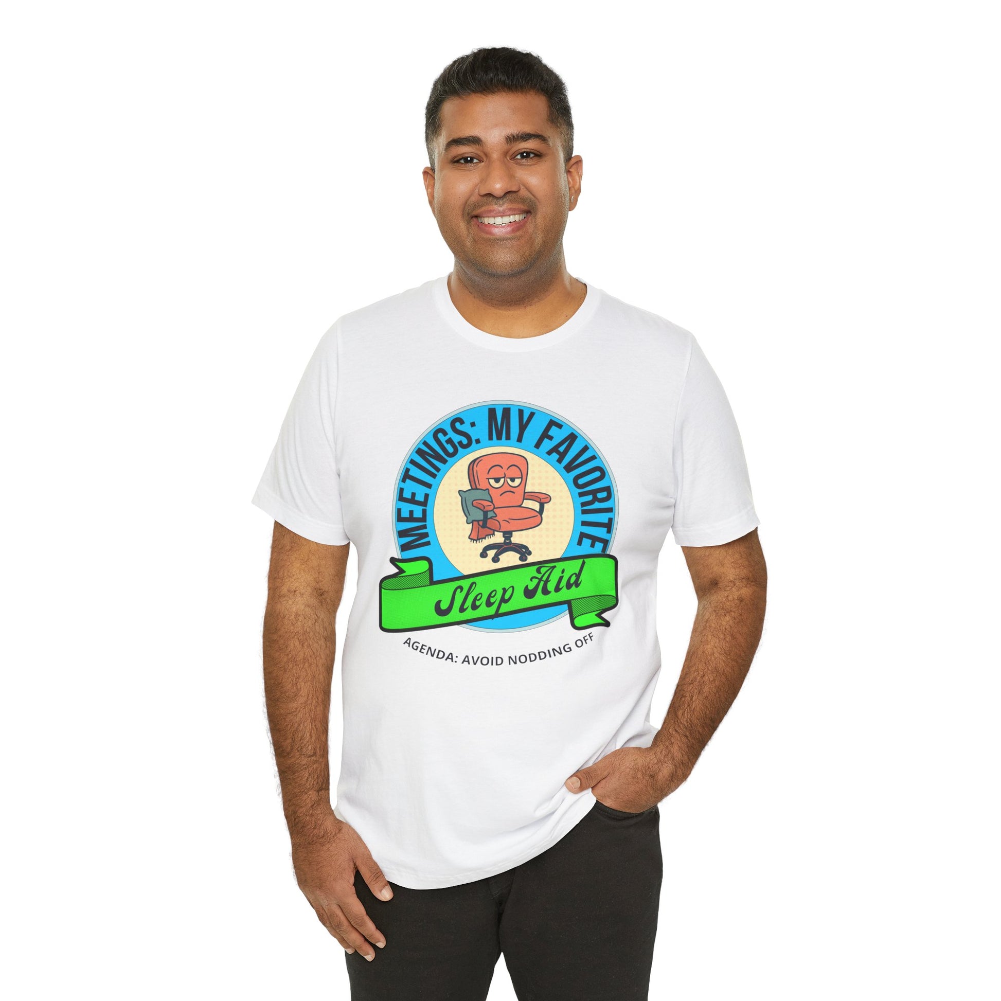 Man wearing a white t-shirt with a graphic design and text 'Meetings: My favorite sleep aid. Agenda: Avoid nodding off' on a white background