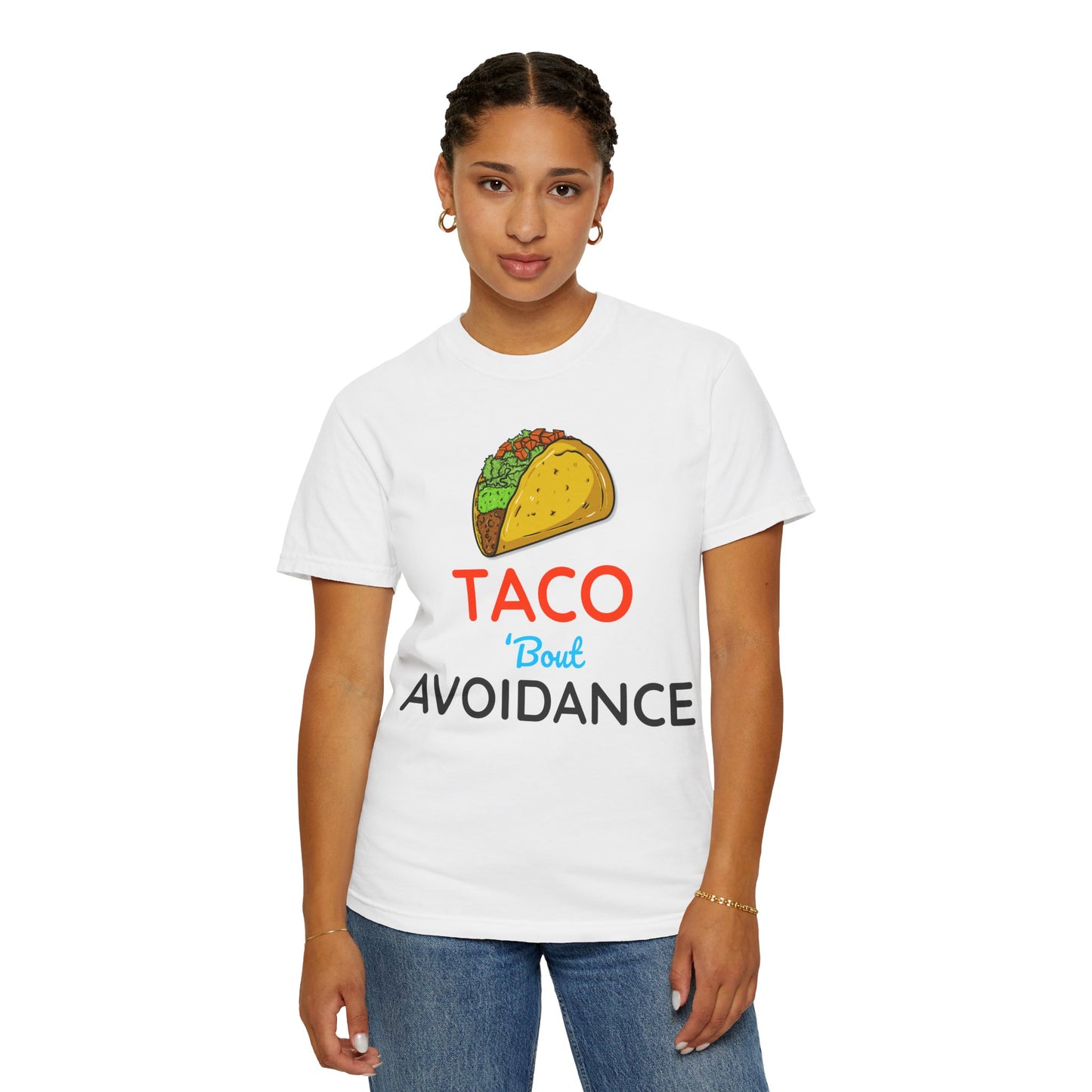 Person wearing a white t-shirt with a taco graphic and text 'Taco 'bout avoidance' on a white background