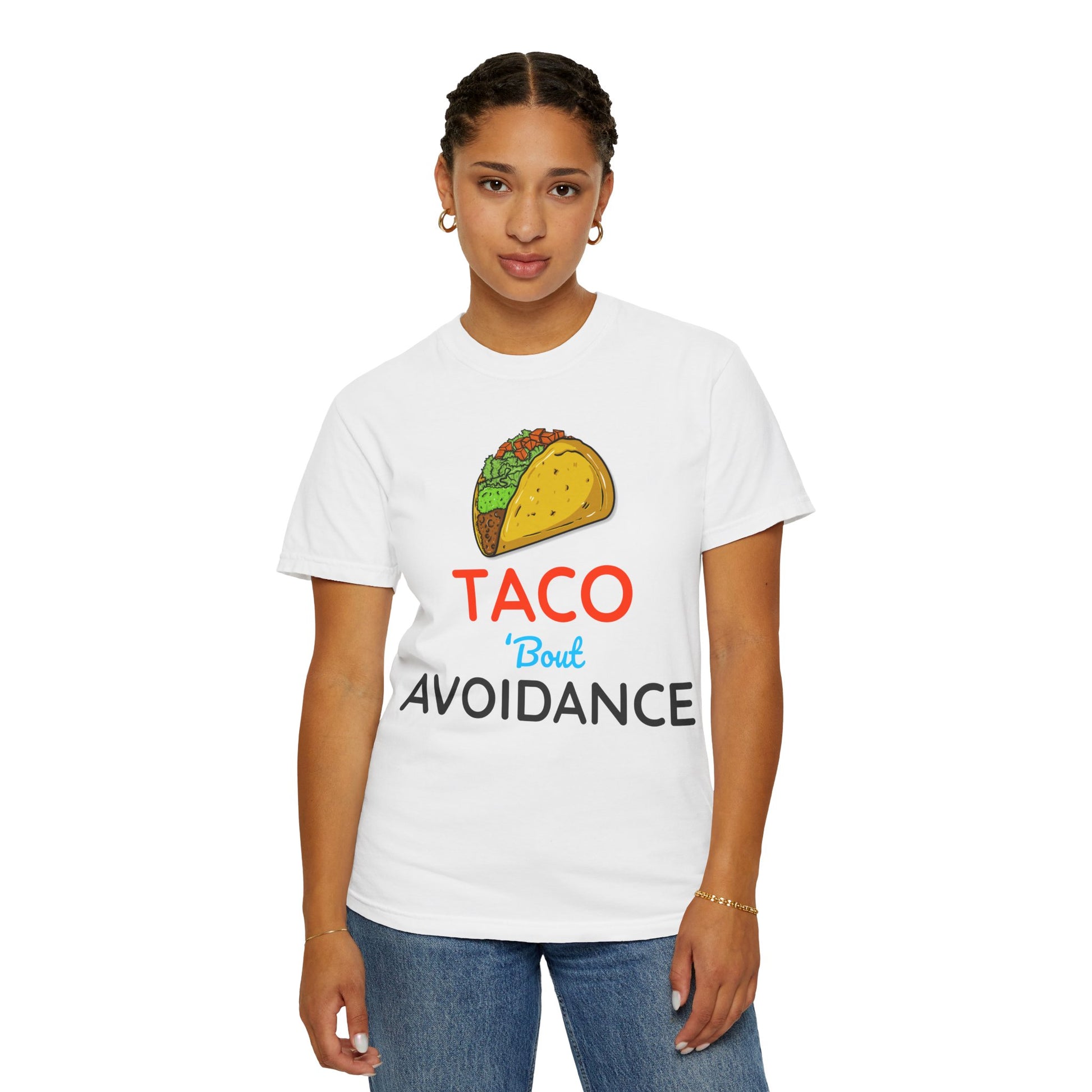 Person wearing a white t-shirt with a taco graphic and text 'Taco 'bout avoidance' on a white background